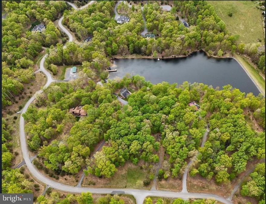 Prepare to construct your dream home! This fantastic lot boasts stunning mountain views.  The community features an array of amenities,  including exclusive lake access to a spring-fed lake, a community picnic pavilion with basketball court for family gatherings.  Over 180 acres of forever wild land, adjacent to the Appalachian Trail on the Blue Ridge, offer miles of hiking and walking trails. This lot is ideal for those seeking a weekend retreat or full-time residence in a tranquil, natural environment.  Whether your intention is to build  immediately or hold for future development, this presents an exceptional opportunity to own land in a serene mountain setting.   Bring your vision and build your dream home within the scenic and established Lake Forest Estates!  This community is an hour from the Northern VA area, when you enter and transform into nature's woods of tranquility.
