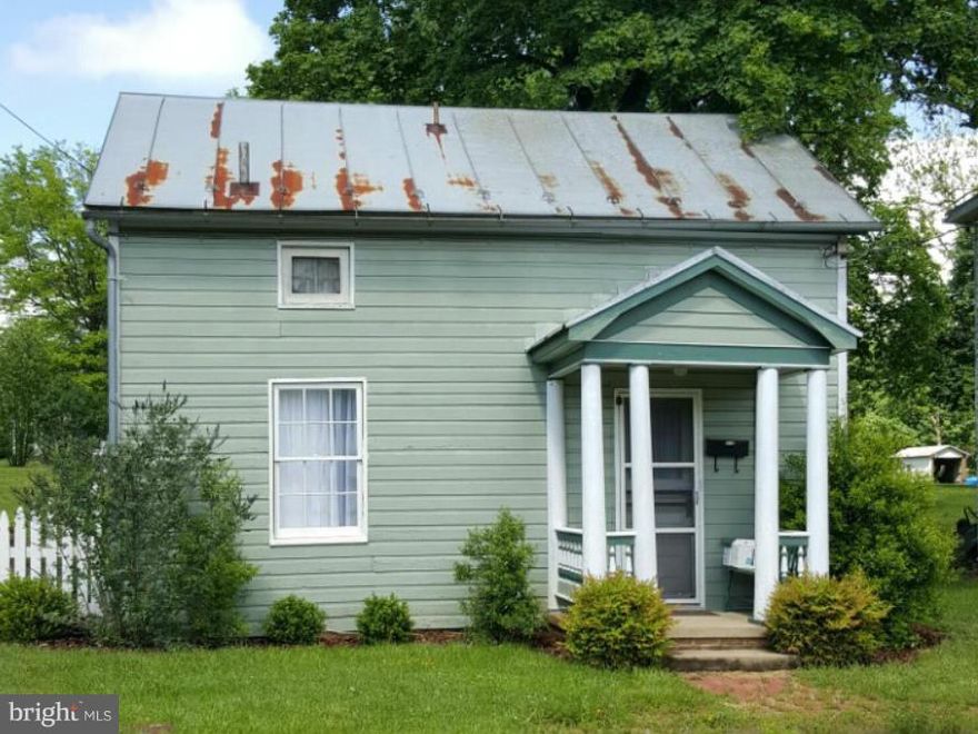 THE PRICE IS RIGHT!!!  Come see this home in the Town of Woodstock.  Inside freshly painted and ready for new owners.  Walk to downtown businesses and enjoy small town living. Heating system is a 2 gas fireplaces, one on main level & one upper level.