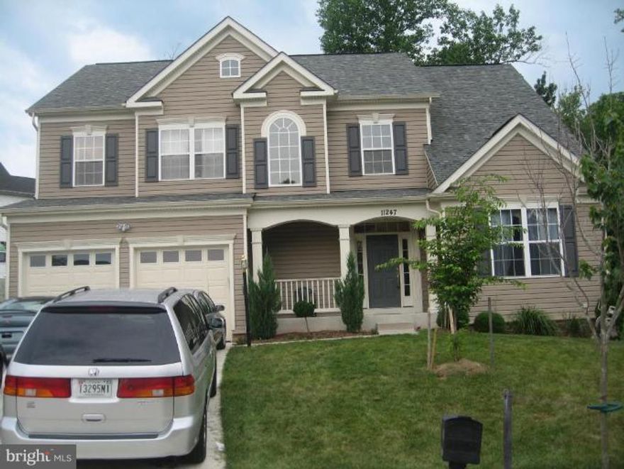 House Shows Well, 4BR, 3.5 BA, Library, Gourmet Kitchen, Sunroom, Family Room w/fp, Finished basement.