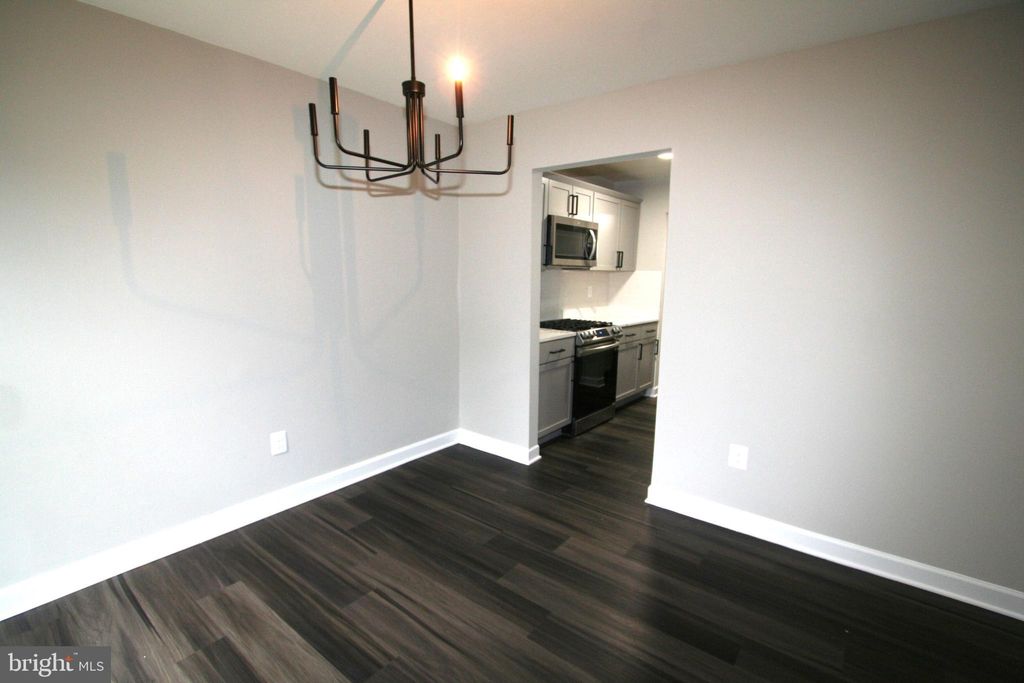 Photo of 8575 Seasons Way #55B, LANHAM, MD 20706 (MLS # MDPG2178756)