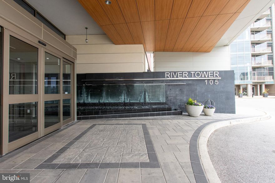 Luxury High-Rise living in Wilmington’s premier waterfront community - River Tower. This 23rd floor end unit offers enhanced privacy and sweeping views of the Christina River and city skyline.

FRESHLY PAINTED contemporary move-in ready 2-bedroom, 2-bath unit with beautiful NEW luxury vinyl  flooring in the main living area, NEW carpet in the bedrooms, a modern kitchen with granite countertops and tile backsplash, stainless steel appliances, and 42" cabinetry. The breakfast counter is perfect for casual dining, The built-in wet bar with additional cabinetry and a mini fridge adds functionality to the dining area.

The floor to ceiling windows allow for a bright open-concept living, dining, and kitchen space and offers sweeping views of the Riverfront and City skyline.  Direct access to a private covered balcony is through the living room. The spacious primary bedroom includes two closets and an en-suite bath with a Jacuzzi tub, frameless glass shower, and large vanity.  The second bedroom has an adjacent full bath.  The in-unit laundry and extra storage area complete the space.  There is also a storage area on the floor for this unit.  One assigned  parking space (#19) in the secure garage is included (additional parking available for a monthly fee of $115.  This space is located on levels 4-6 of the garage).

Residents of the River Tower enjoy many luxury amenities: a state-of-the-art fitness center, rooftop saltwater pool and hot tub, gas grilling stations, indoor/outdoor entertainment areas, dog park, 24/7 concierge, and on-site management.

Conveniently located along the vibrant Wilmington Riverfront, you’re just a short walk to Market Street and River front dining, the Amtrak/SEPTA station, and moments from I-95.  Air condition replaced in 2024 and dishwasher this year.