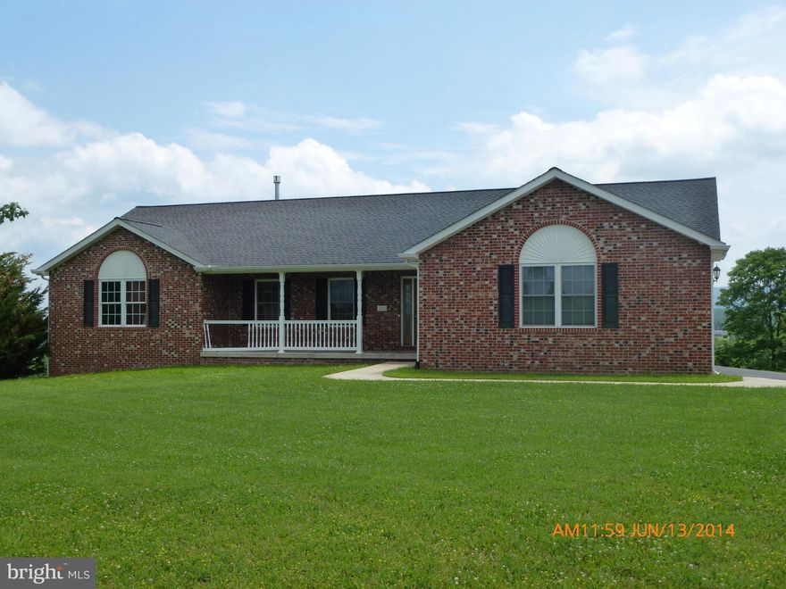 This large rancher has great possibilities and once repaired has so much to offer.  The rooms are large, the basement is huge with partially studded walls.  The location is convenient to downtown Berkeley Springs and major commuting routes, and within walking distance of the new hospital.  In present condition will not go conventional, FHA or USDA.  Needs Cash or Rehab loan.