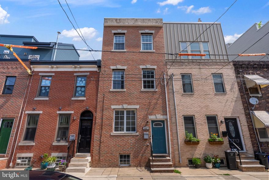 Welcome to 1607 Manton Street — a move-in ready Point Breeze home offering space, flexibility, and long-term value.

This well-maintained 4-bedroom, 2.5-bath brick-front residence features an open-concept layout that’s ideal for today’s lifestyles. Natural light fills the spacious great room through a large front window, creating a warm and inviting first impression.

The main level flows effortlessly into the eat-in kitchen, complete with stainless steel appliances, real maple cabinetry, and granite countertops—perfect for everyday living or entertaining. Sliding glass doors open to a private backyard, offering a quiet retreat for relaxing or hosting guests.

Hardwood floors throughout, ceiling fans in every room, two-zone HVAC, and a full renovation completed in 2010 make this home truly move-in ready. The second and third floors each feature two generously sized bedrooms and a full hall bathroom, providing flexibility for roommates, guests, or work-from-home space.

The fully finished basement adds valuable square footage with tile flooring, a laundry area, and an egress window for natural light—ideal as a second living space, home office, gym, or entertainment area.

With a Walk Score of 89 and located just two blocks from the Broad Street Line, this home offers easy access to Center City, Rittenhouse Square, and the Sports Complex. Nearby neighborhood favorites include American Sardine Bar, Dock Street Brewery, Sprouts, Giant, Target, Chew Playground, and more. Permit parking adds everyday convenience.

Perfect for first-time buyers seeking space and value, or investors looking for strong rental demand in a prime South Philadelphia location.
Seller is open to a quick settlement — schedule your showing today.
Agent is related to Seller.