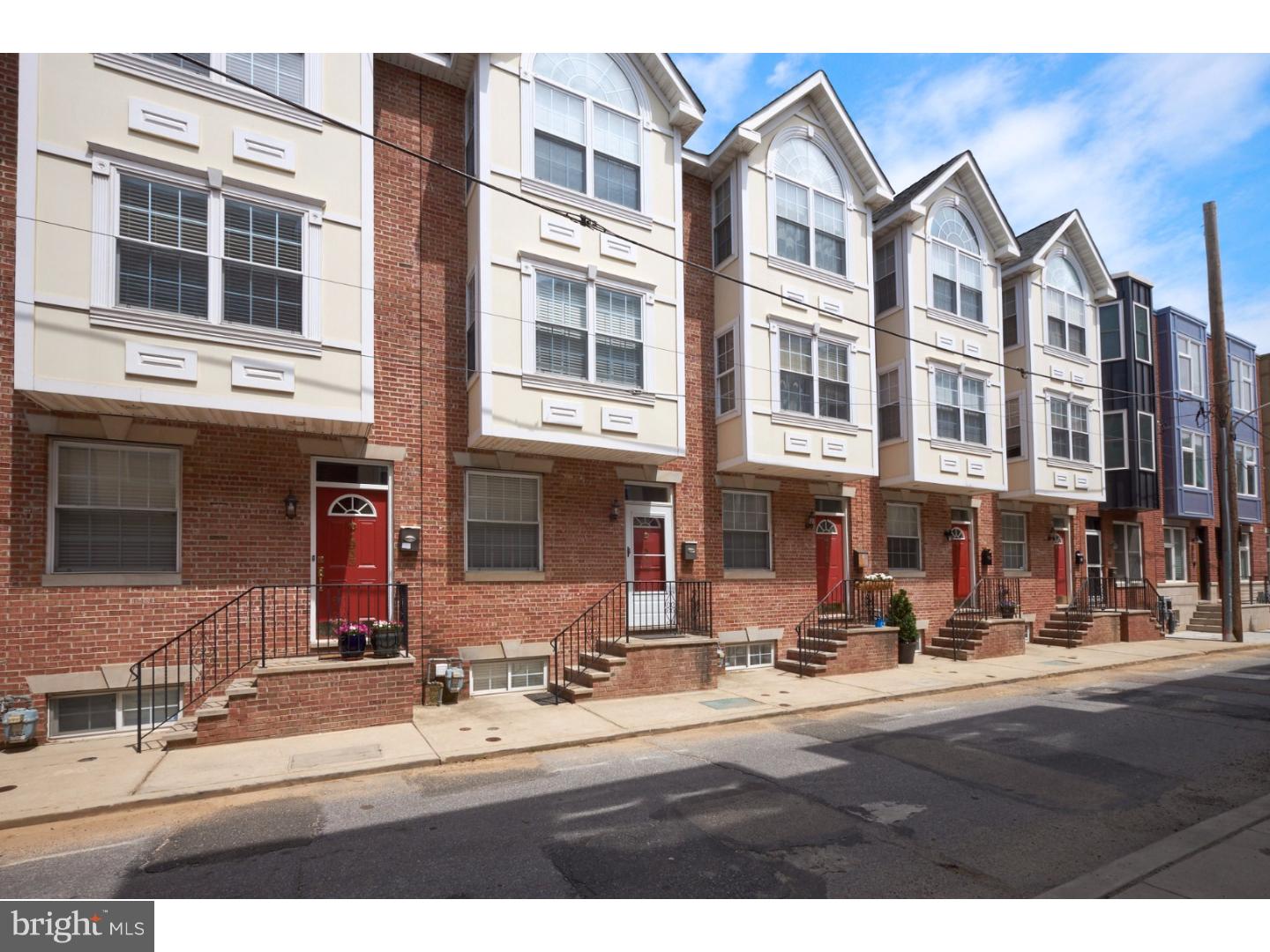 Stunning newer townhome in the highly coveted Graduate Hospital neighborhood! This home has it all from a finished basement to a rooftop deck where you can soak up the sun and enjoy views of the Center City skyline. Striking architectural details include a 2-story bump out (creating even more living space inside!) and window banding with a keystone accent. Step inside to be greeted by a contemporary, open floor plan with warm hardwood flooring, recessed lighting, and a large archway into the kitchen which creates a clean line of sight all the way from the front to the back of the home. The spectacular kitchen is spacious and thoughtfully designed with stainless steel appliances, custom cabinets, granite countertops and a center island that can double as a breakfast bar. This space is bathed in natural sunlight from the large slider as well as a window located conveniently above the sink. Up one flight of stairs you'll find two spacious bedrooms with neutral carpeting, large windows, recessed lighting and ceiling fans. A full bath features ceramic tile flooring, tile tub surround and a large vanity.  On the third floor, you'll find one of many breathtaking scenes with a uniquely sophisticated penthouse master bedroom suite. Recessed lighting, a distinctive window niche with a large custom window, and an electric fireplace make this space an enticing retreat. The en suite bath offers a spa-like experience with an immense soaking tub with tile surround, a shower with frameless door, his & hers sinks and yet another larger than large window.  The piece de resistance is the amazing rooftop deck which offers excellent opportunities for outdoor entertaining or relaxation with the sky above and Center City on the horizon. Or, head down to the finished basement to enjoy even more versatile living space which can be used as a den, rec room, home office or more. Conveniently located not far from Rittenhouse Square, the Chew Playground and Marian Anderson Park are steps away. Inside and out, this impeccably finished townhouse offers a charismatic and sophisticated place to call home. The tax abatement is still in effect on this home through March 2019. Inquire today!
