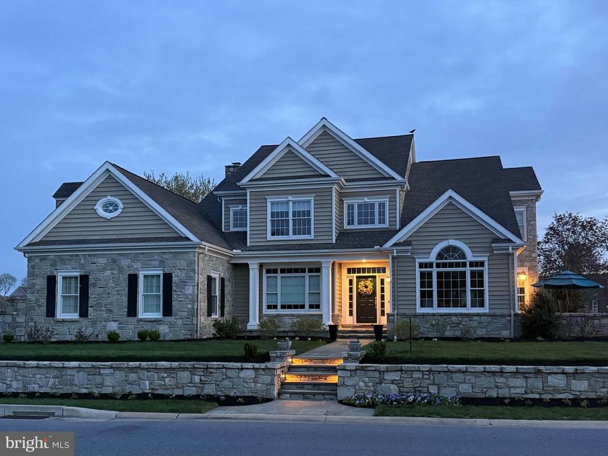 Thoughtfully reimagined by its current owner, nearly half-acre homesite within the prestigious Bent Creek Country Club community, this exceptional residence blends timeless architecture with extensive modern upgrades. With captivating curb appeal and thoughtfully enhanced interiors, this home delivers both presence and performance.Step inside to a striking two-story foyer highlighted by a completely rebuilt grand staircase featuring new treads, risers, balusters, and handrails—setting the tone for the craftsmanship found throughout. The open-concept layout is filled with natural light, enhanced by new lighting fixtures, oversized interior doors, and updated baseboards that create a clean, cohesive aesthetic across the entire home.The heart of the home is the beautifully updated gourmet kitchen, where painted cabinetry is complemented by new granite and quartz countertops, double ovens, and a new dishwasher. A custom cabinetry room divider with integrated shelving seamlessly connects the kitchen to the family room, offering both function and architectural interest.The family room has been reimagined with a stunning custom masonry wood-burning fireplace and built-in entertainment system—creating a warm and inviting space for gathering. Just off the main living area, the fully renovated home office features hickory hardwood flooring and custom built-ins, providing a refined and productive workspace.Upstairs, the completely remodeled primary suite offers a private retreat with its own dedicated HVAC system, a new gas fireplace, and a fully redesigned luxury bath. Custom-built closets, an additional closet addition, and new doors elevate both function and style. Additional bedrooms remain spacious with walk-in closets, including a well-appointed ensuite and shared bath configuration.The finished lower level has been refreshed in October 2025 with new carpeting, lighting, paint, and a drop ceiling—offering expansive space for recreation, fitness, or entertaining.Outside, two flagstone patios provide multiple outdoor living options—whether enjoying peaceful garden privacy or overlooking the scenic golf course setting.Additional major improvements include a new natural gas line to the home and upgraded attic insulation with blown-in cellulose for enhanced efficiency and comfort.Located just steps from the amenities of Bent Creek Country Club—including golf, tennis, fitness, dining, and pool options (membership optional)—this home offers not just a residence, but a lifestyle within one of Lancaster County’s most sought-after gated communities