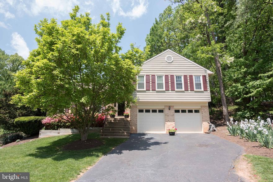 STUNNING 4BD/3BA split level home in private cul-de-sac. Upgraded kitchen and bathrooms, home theater, play room with built in storage, custom closet in master bedroom. Remodeled backyard with spacious walk-out deck and stone patio, ideal for fire pit. 2 car garage. Close proximity to Tysons, Vienna and Greensboro Metro station.