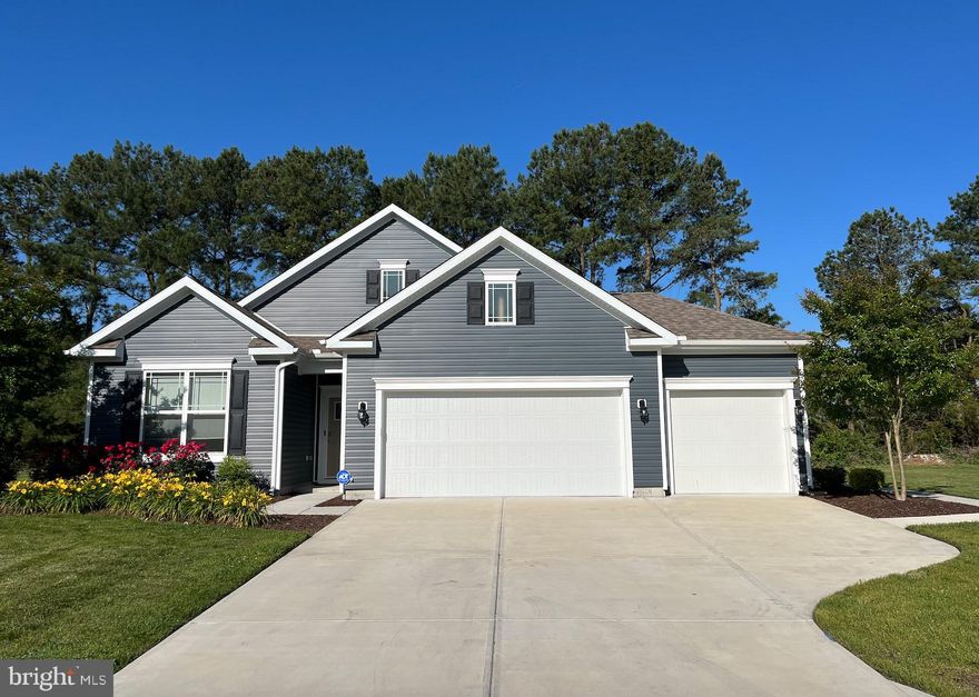 Exquisite Coastal Retreat in Hunt Club South.  Discover the epitome of luxury and single-level living in this immaculate 3-bedroom, 2-bathroom home spanning 1,748 sq. ft., located in the highly sought-after Hunt Club South community and Fruitland school district.  With a three-bay garage and thoughtful upgrades throughout, this home offers unparalleled comfort and style.  Gourmet Kitchen & Elegant Design - Step into the heart of the home: a chef’s dream kitchen featuring an oversized island, gleaming quartz countertops, a premium Kraus sink and faucet, and a newly installed electric range (may be converted back to gas for your preference). The vented stainless steel range hood, soft-close white shaker cabinets, and two custom-built pantries ensure both functionality and sophistication. Upgraded lighting and an under-sink water filtration system add modern convenience to this culinary haven.  Sophisticated Living Spaces - Soaring 9-foot ceilings and recessed lighting create a bright, airy ambiance throughout the open floor plan. The owner’s suite serves as a private retreat, boasting a spacious walk-in closet outfitted with custom soft-close shelving and drawers. The en-suite bathroom features a walk-in shower and an oversized double vanity, offering both luxury and practicality. Indoor-Outdoor Living at Its Finest - A recently added screened porch provides the perfect space to unwind or entertain, while the rear cement patio extends your outdoor enjoyment.  Exceptional Three-Bay Garage - Car enthusiasts and hobbyists will appreciate the fully finished three-car garage, complete with insulated doors, epoxy/LVP flooring, recessed lighting, upgraded door openers, fire sprinklers, and additional attic insulation.  Smart Living & Security - The ADT Smart Home Package integrates seamlessly with your mobile device, allowing you to control and monitor nearly every system. A comprehensive outdoor security system ensures peace of mind. Prime Location - Conveniently located near upscale shopping, dining, Salisbury University, and the Rt. 13 Bypass, this home is a rare gem combining elegance and practicality.  Don’t miss the opportunity to call this extraordinary residence your own. Schedule your private showing today—luxury living awaits!