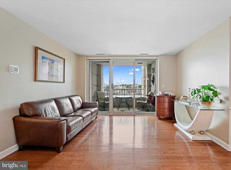 Welcome to Harbor View! Here, at 100 Harborview Dr, unit #204, you will find an exquisite 2 bedroom, 2 bathroom condominium boasting a breathtaking Inner Harbor view from the balcony. The unit features an expansive open floor plan comprising a living room, dining room, and kitchen, all adorned with stunning hardwood flooring. The primary bedroom features ample closet space and a private bathroom. The furnace is new, ensuring optimal heating efficiency. The property includes a private storage unit and a garage parking space for your convenience. Community building amenities are plentiful, including a pool and a front desk concierge service. The property will be delivered vacant, allowing for immediate occupancy. This is an opportunity that you do not want to miss! Schedule your showing today and experience the best that Harbor View has to offer!