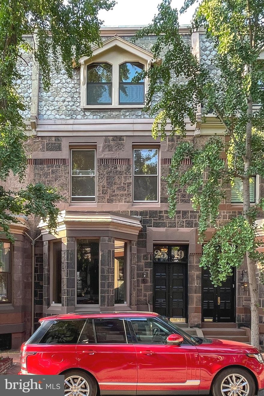 This is a one-of-a-kind brownstone, attributed to renowned architect Frank Furness Circa 1876 and is located on one of the most desirable & picturesque blocks in Fitler Square. This unique property has been transformed into an incredible multi-unit dwelling. The main owner’s unit offers three levels of living space. Exposed beams, circular stairs, track and recessed lighting, wood flooring, spacious kitchen, marble and tile baths, decorative (non-working) fireplaces, two spacious bedrooms, library/office, amazing natural light, rear garden and secure PARKING are just some of what you’ll find. The property also includes two, self contained, 1 bedroom, 1 bath apartments, each bright unit features high ceilings, built in shelving, recessed lighting, full kitchens, wood flooring and carpeting plus tile baths. All separately metered with gas hot air heat w/central air, except one apartment doesn’t have central air. Great opportunity to make into a grand single home or to live in and receive rental income.