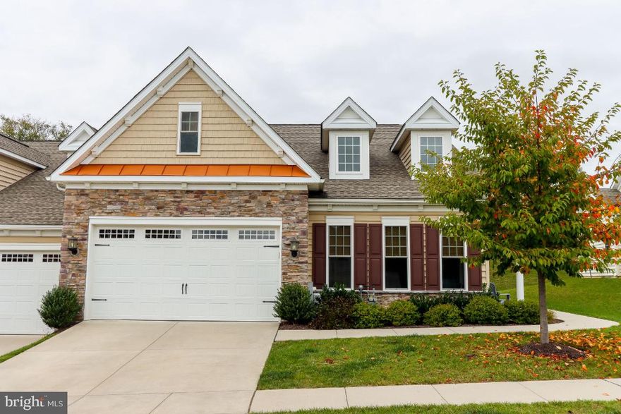 A very impressive open floor plan with gleaming wood floors that encompasses a beautiful kitchen with granite countertops, 42 inch upgraded cabinetry, an oversized peninsula and quality stainless appliances. 
Enjoy the master ensuite which is filled with natural light, a large walk-in closet and a luxurious bath, his and her vanities and a tiled walk-in shower.
The beautiful upper level encompasses a large open loft, a cozy bedroom, full bath, and optional use room, a perfect and private area for visiting family and friends. 
Meet up with your neighbors and friends at the community center, a beautiful outdoor stone structure in the heart of the neighborhood. The interior is equipped with a warm fireplace and a completely equipped kitchen. Community fees include snow & trash removal, sewer, water, and lawn & exterior building maintenance.