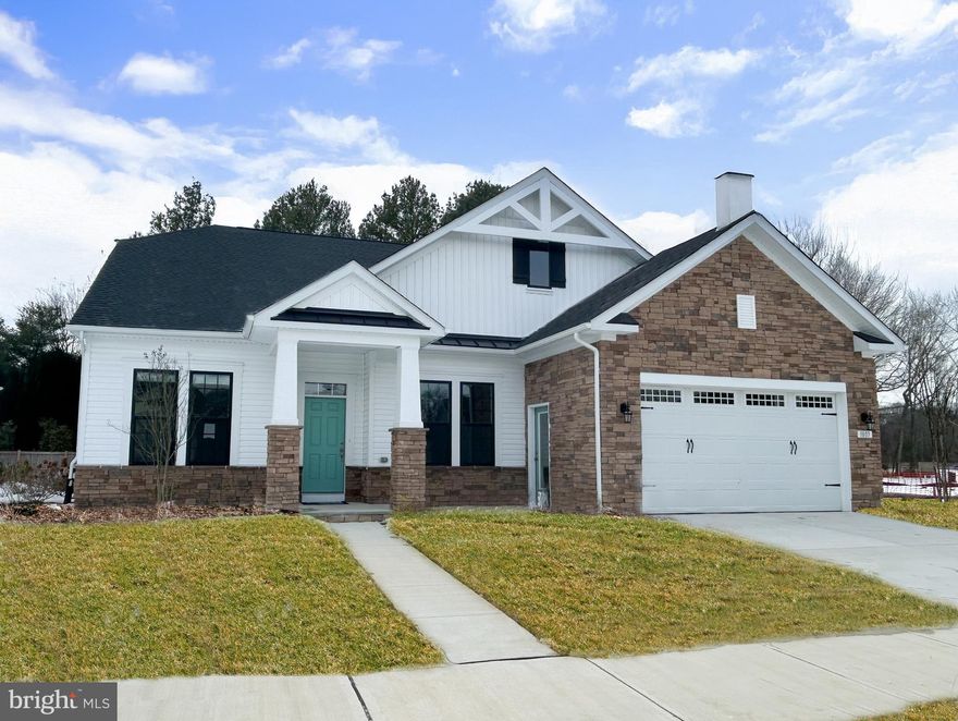 Former main level living model is Ready for Move In!  
Step inside the foyer to a bright open floorplan with 10' ceilings!  The heart of the home is a chef's dream kitchen, with Gourmet Stainless Steel appliances, white cabinets and quartz counters. The rear of the home is the family room which leads to the screened in porch, perfect for relaxing. The primary bedroom offers an en-suite deluxe bath with separate shower and tub. Oak stairs lead to the 2nd level where there is a loft, 3rd bedroom and 3rd full bath.
Located in Lakeside at Trappe, a vibrant lakeside community with a plethora of amenities and ideally located on Maryland's Eastern Shore. Lakeside at Trappe is a private retreat to live, work, and play all in one place.  Community currently offers a pool, bathhouse with fitness room, ping pong, corn hole and Bark park, playground and racquet sports courts plus a planned immersive lakeside experience also in the works!
Ask about closing assistance