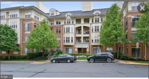 Photo of 1855 Stratford Park Pl #214, RESTON, VA 20190 (MLS # VAFX2296428)