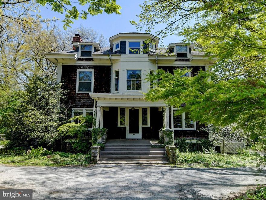 Rarely available, the entire first floor of this Roland Park Victorian home is chock full of timeless character- original stained glass at the front door, high ceilings, large wooden pocket doors, and refinished hardwood floors. The kitchen has been updated with stainless appliances and granite counters. Flexible living spaces boast classic built-ins and decorative fireplaces. There is a small sunroom off the largest bedroom currently used as a walk-in closet. The bathroom has also been renovated with a newly tiled tub. This apartment has previously been used as three bedrooms but it could also be a two bedroom with a large study. With 2,000+ square feet this apartment truly feels like a private home as you enjoy sitting on the front or side porches and take in the green views- you won't believe you are in the city! The large yard offers gardening opportunities as well as a firepit for summer evenings. Off street parking and laundry on-site also included. Downsizing but not quite ready for those small condos? This home-like apt is the perfect solution!