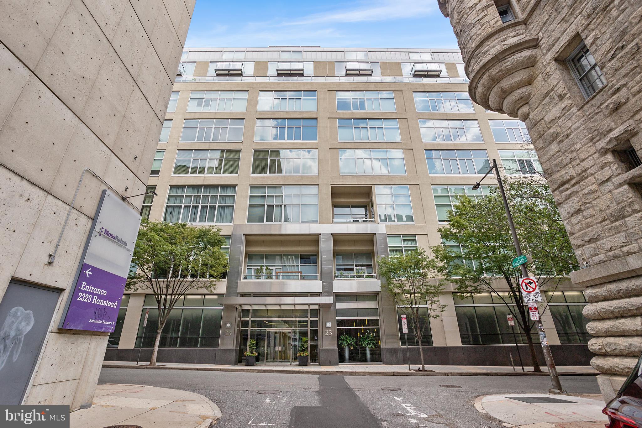 This comfortable and accessible two-story penthouse redefines the concept of home with an open floor plan, floor-to-ceiling windows, and THREE private balconies. The high ceilings and overall width highlight the scale of this home; you'll feel it the moment you walk in the door. The large kitchen features ample marble counter space and cabinet storage, a customized pantry, an upgraded backsplash, and a breakfast bar, all overlooking an enormous living and dining area with new flooring. The first floor, with upgraded touches, ample natural light, and a refinished powder room, also features an alcove that can be arranged as a working den or extra seating area. A wide staircase leads up to two magnificently large bedrooms, each with its private marble bath, floor-to-ceiling windows, significant closet space, and a private balcony in each bedroom. The first bedroom boasts the highest ceiling height, a skylight, an extra-wide closet, a full bathroom, and a balcony. The hallway leading to the Master Bedroom offers a deep, shelved closet for linens and storage, as well as a wide laundry room with a side-by-side washer and dryer and extra shelving. The enormous master bedroom features two walk-in California closets with personalized finishes, an additional storage closet, and a spacious bathroom with a shower, a tub, and his-and-her cabinets. The Master Bedroom overlooks the inner terrace and the building's gardens, featuring a balcony that offers an oasis to those seeking a quiet, green space amidst city life. Both bedrooms have customized blackout curtains that block out light and noise, providing a peaceful evening experience. This penthouse condo features under-stairs storage and a storage unit located within the building. This elevator doorman building is minutes from Penn, Drexel, 30th Street Station, and Rittenhouse Square. Enjoy the beauty of the recently extended Schuylkill River Walkway. Within a few blocks, you'll find The Fitler Club, Trader Joe's, and Giant. A garage is located inside the building, offering spaces available for rent or for sale.