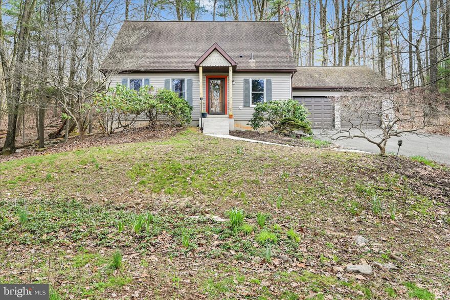 Lake Life Living at Its Finest!  Welcome to this beautiful home in the sought-after Lake Wynonah community, perfectly situated on a private lot—plus an additional adjacent lot offering an extra 0.3 acres for added space and privacy.  Inside, you’ll find a warm and inviting interior featuring both a spacious living room and family room with hardwood floors, along with durable tile flooring throughout key areas. A dedicated office space provides the perfect setup for working from home or managing day-to-day tasks. Stay cozy during the colder months with a Harman coal stove, adding both efficiency and charm to the home. A spacious 2-car garage adds everyday convenience.  Step outside to a large screened-in patio—perfect for entertaining, summer BBQs, or simply relaxing and enjoying peaceful evenings with family and friends.  This gated community offers two freshwater lakes and a wide range of amenities, including a lodge with dining, bar, and gathering/library space, boating, fishing, wakeboarding, waterskiing, and tubing. Enjoy tennis and pickleball courts, a community pool, parks, pavilions, scenic hiking trails, a marina with beautiful docks, and abundant natural wildlife.  Enjoy a vibrant community conveniently located less than an hour to Allentown, Harrisburg, Hershey, and Reading—and just 1.5 hours to Philadelphia.  Schedule your private showing today!