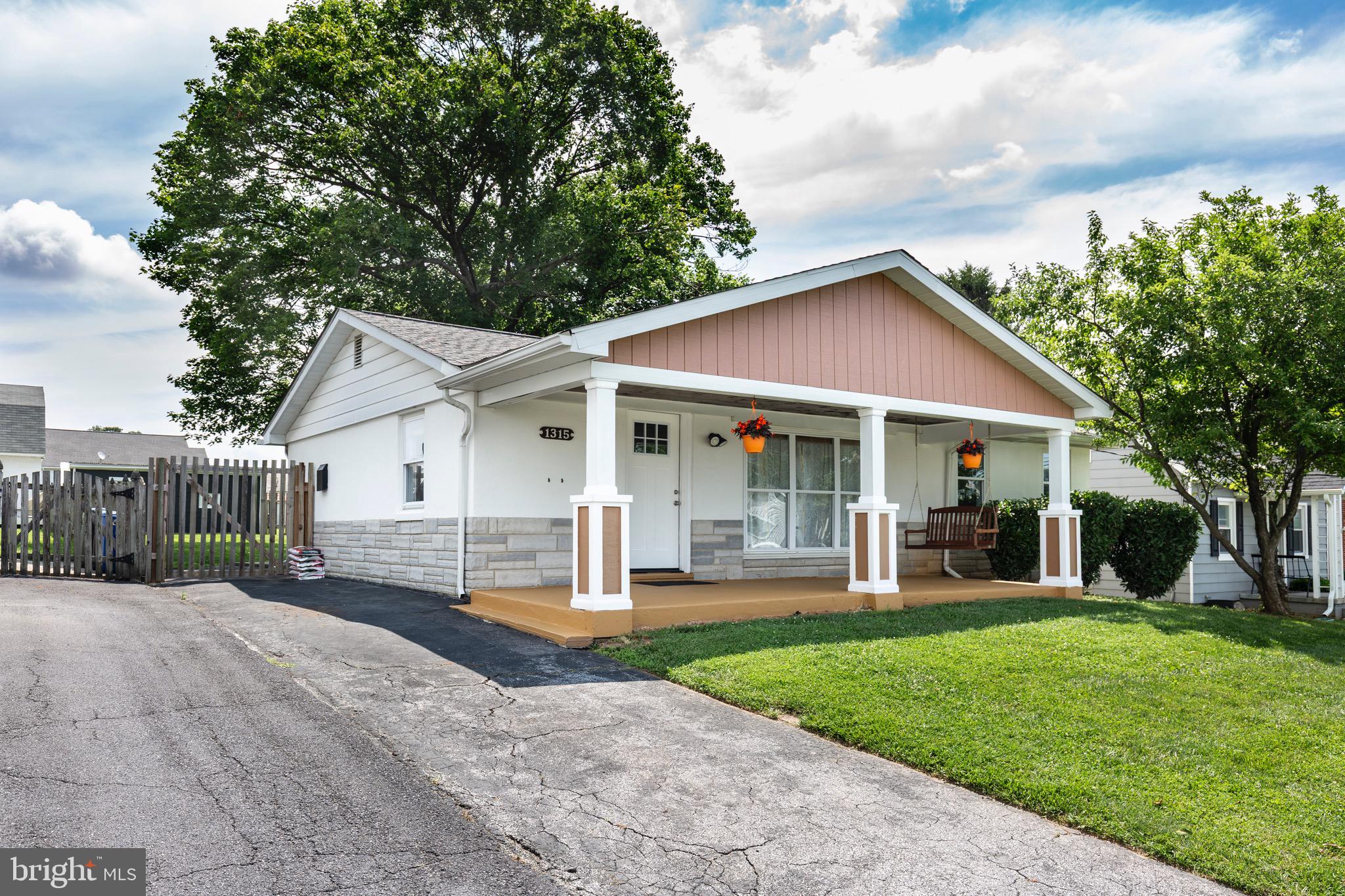 Home Sweet Rancher! Fresh updates and timeless charm await you in this 3-bedroom beauty featuring new flooring, modern lighting, and fresh paint throughout. Relax on your porch swing as you take in your fenced yard—perfect for pets, gatherings, or quiet evenings. You’ll love the spacious full basement for storage, crafts, or a workshop, and the detached 2-car garage offers room for your vehicles, hobbies, weekend projects and everything in between. This move-in-ready home is waiting for you to start your next chapter!