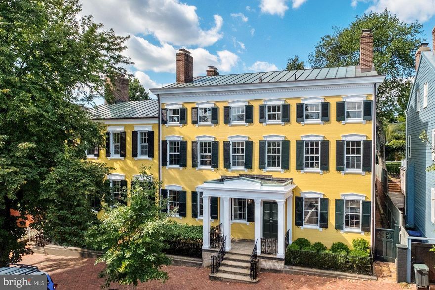 ****Price just reduced 2 million****                                                                                                                                                                                            Rare one of a kind estate  and special opportunity in the heart of Georgetown. This property is one of the few true Georgetown estates and includes approximately 11,100 square feet of living space. The grounds encompass .68 acres of impeccably designed gardens, multiple out buildings, a pool, a parking lot for 40+ cars, two 2 car garages (accessible through an alley on N Street), greenhouses and more. The 10 bedroom, 6.5 bath main residence features three stunning public rooms which include the parlor, library and dining room, a  l'orangerie, 12 fireplaces, impeccable moldings and historical details throughout.  This property showcases a half acre of gardens including terraces, grand estate walls, a bowling green, large herb garden, and boxwoods originally designed by Rose Greely in 1930 and later update by Perry Wheeler and Andrea Filippone. Additional highlights of this estate include an entertaining pavilion/theatre with fireplace and large basement workroom, two green houses, a pool with pool house changing rooms and a four bedroom guest/staff house. Showings by appointment.  Seller has not occupied the property. Furnished photos are from previous owner.  Existing floor plan is available and on virtual tour.   New floor plans may convey.