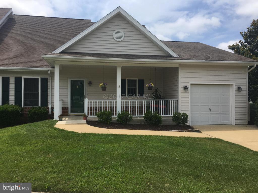 Beautifully upgraded and maintained 2BR, 2BA home directly across from the Clubhouse. Newer flooring & paint make this property move-in ready. Spacious built-ins and gas fireplace compliment the open floor plan.