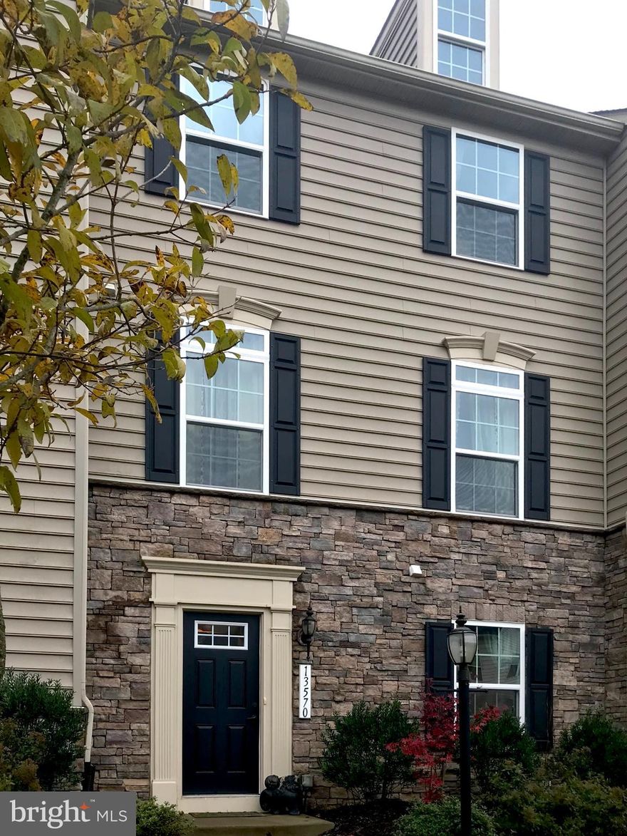 The Wentworth Green is a prestigious new community with fun activities and amenities within reach! Beautiful community clubhouse with two pools, basketball court, tennis court, dog park, 2 playgrounds, extensive walkways and trails, provide lots of the possibilities for kids and adults to enjoy! Nearly everything you could ever want is within walking distance; The Promenade, The Virginia Gateway, Life Time Athletic, Movie Theatre, Jiffy Lube Amphitheater, are few to mention! It is also, very close to great schools and mass transportation centers. Close proximity to major roads and I-66 are very desirable! In summary, this 22' wide Townhome is perfect for people who are looking for a healthy and active life style with most amenities within their walking distance!  Beautiful brand new carpet was just installed in bedrooms upstairs  and in the Den at the lower level! Roughed-in full bath in lower level, for the possibly using the Den as 4th bedroom! The Pre-approval financial letter must accompany your offer!