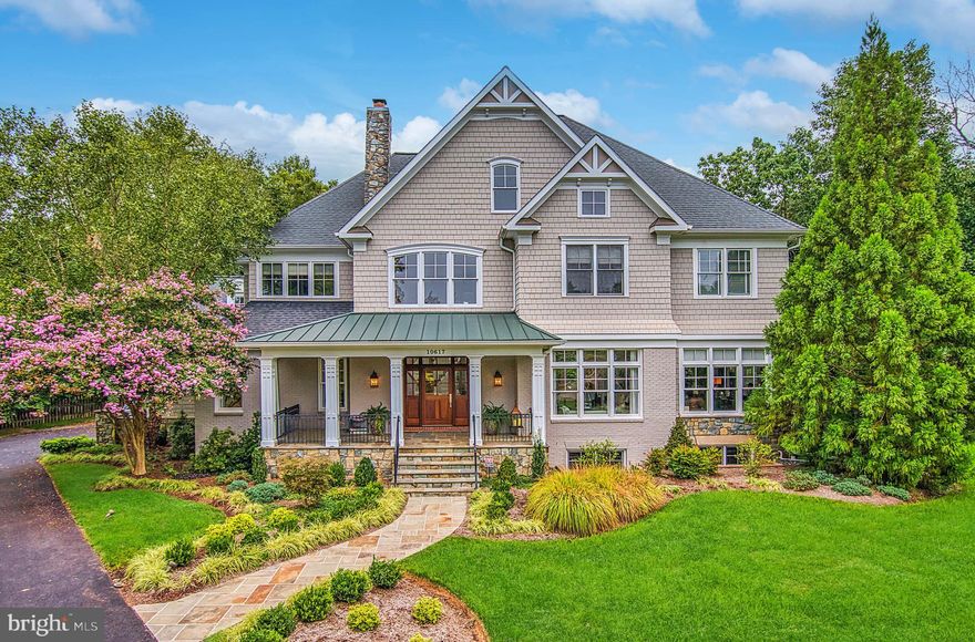 Wow! An Entertainer's Dream! Welcome to 10617 MacArthur Blvd, a custom build spanning 8,700 SF on 4 levels. This beautiful home boasts 6 Bedrooms and 7.5 Baths. Less than half a mile away, take a light walk on the C&O Canal or a more intense hike on the Billy Goat Trail, followed by a beer in the Garden at Old Anglers Inn! The Main Level features a Sun-Filled, Two Story Foyer with a Formal Dining Room and Living Room on either side. The Family Room has a Floor-to-Ceiling Stone Fireplace and a Coffered Ceiling. A Rare, Double-Sided Fireplace adjoins the Chef's Kitchen to a Breakfast Room with a Vaulted Ceiling and Large Windows. The Laundry Room features a Walk-In Closet and Powder Room and leads to a 3-Car Garage. A Home Office or Optional Main Level Guest Bedroom is located next to a Full Bath. The Main Level flows beautifully to the Outdoor Patio with a Fire Pit and Built-In Grill surrounded by lots of landscaping and privacy. On the Second Level, the Primary Bedroom has a Sitting Room, Home Office/Dressing Room, 2 Large Walk-In Closets, and a Full Bath with a Double Vanity. All 3 spacious Secondary Bedrooms on this level feature En-Suite Baths. The Third Level offers a Game Room or Optional Bedroom with a Full Bath and Closet. The daylight Lower Level is a Walk-Up featuring a Finished Recreation Room with a Stone Surround Fireplace, Au Pair/Guest Bedroom, Full Bath, Exercise Room, and a large Storage Room. Central Vacuum System,  Irrigation System and extensive outdoor professional lighting and new professional landscaping. Ideally located just off the Clara Barton Parkway offering easy access to I-495, the Beltway, I-270 - the BioMed Corridor, Tyson's Corner or points downtown.  Close local shopping is right in Potomac Village, Cabin John Mall or Westfield Montgomery Mall.  Cross the street and enjoy Great Falls National Park (MD) with Billy Goat Trail or ride your bike the 13 miles into Georgetown --or, for a longer ride, connect to the Capital Crescent Trail.  Go ahead.  Prepare your guest list and start planning your Spring and Summer parties now! Whitman school cluster.