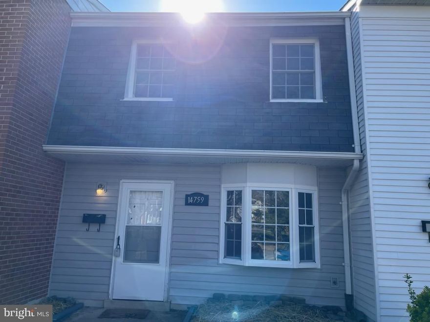 TWO LEVEL TOWNHOME W/ 3 BR & 1.5 BA.  Great Location.