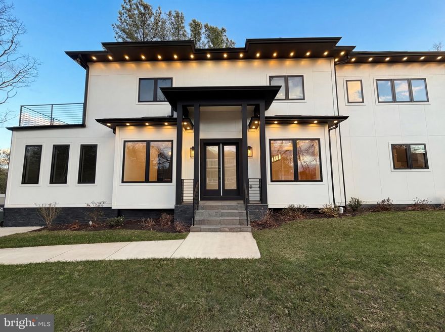 The fireplace stands as the central focal point of the living area at 4246 15th St N. The kitchen features an accent backsplash, all stainless steel appliances, and a kitchen island. The primary bathroom includes double sinks and a jacuzzi tub. The primary bedroom contains a walk in closet. The exterior space consists of a fenced in backyard. The residence concludes with these specific interior and exterior elements.. Included 100-Day Home Warranty with buyer activation