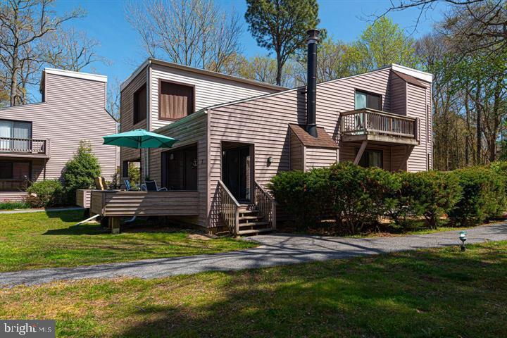 Showings Begin Saturday 8/23 *** Welcome to the Borderlinks Community in Ocean Pines * Updated 3BD/2BA end-unit townhome with golf course and water views with a highly sought after floor plan including a first floor owner's suite w/private full bathroom; an open kitchen/dining/living room with vaulted ceilings & wood burning fireplace * Top floor includes two bedrooms w/double beds; full bathroom #2 & a private 2nd floor balcony & Laundry* Make this your primary residence; getaway beach home or long-term investment property (short-term and long-term rentals allowed) * New roof in 2022 & HVAC in 2019 * Less than one mile is the Ocean Pines Yacht Club & water taxi into Ocean City * Additional amenities include Ocean City beach club; Numerous community tennis courts & swimming pools; community dog park; community bike/walking trails, playgrounds and much much more! Golf Memberships are available separately (See Disclosures) Home has been meticulously maintained and never rented by current owners**