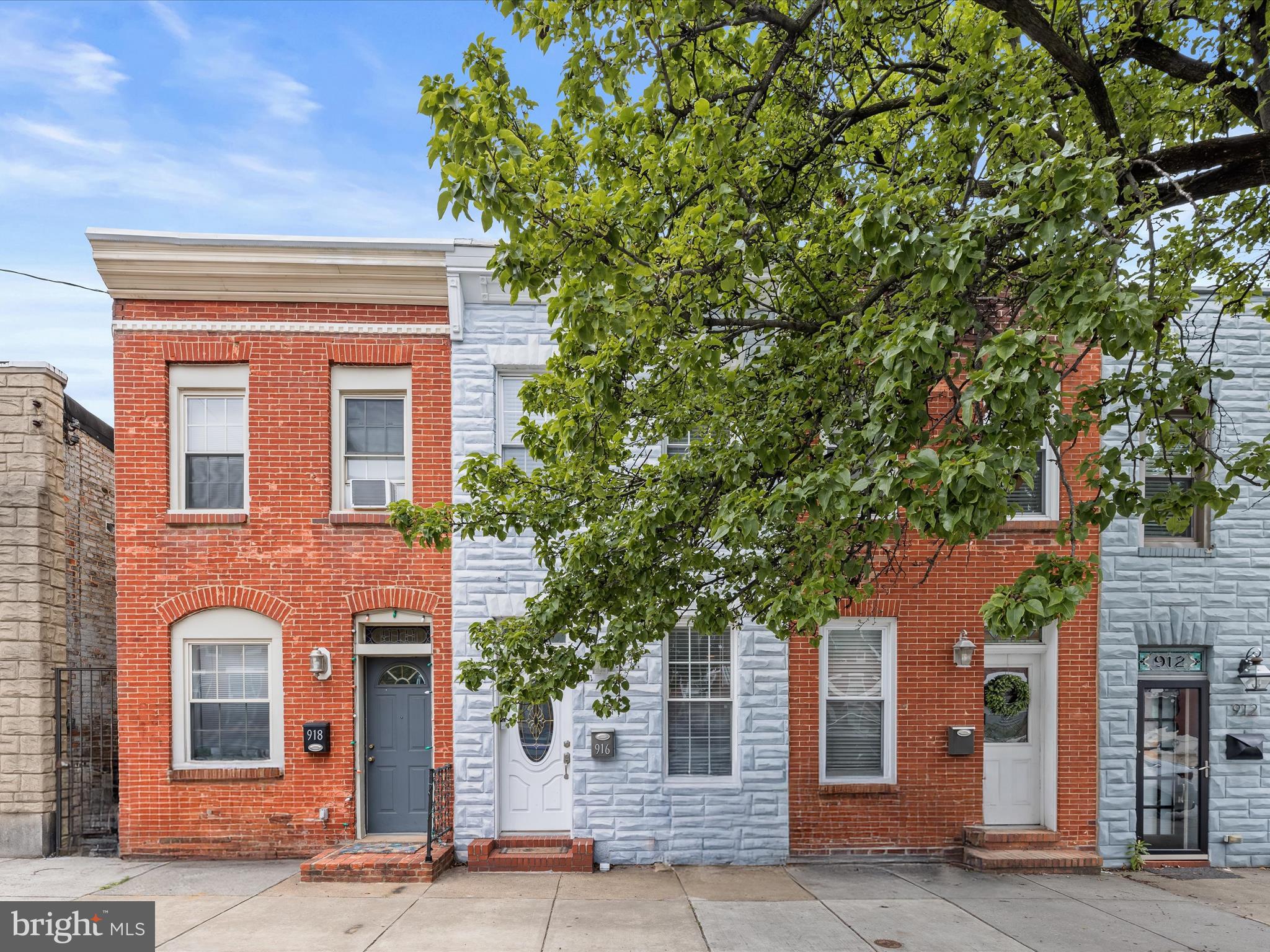 Updated throughout and full of charm, this one bedroom, one bathroom rowhome offers stylish city living in Brewers Hill/Canton. The open concept main level showcases crown molding, recessed lighting, and a warm front living room with an exposed brick accent wall and tongue and groove wood plank ceiling that extends into the dining area. The eat-in kitchen boasts quartz counters, stainless steel appliances, 42-inch cabinets, and a tile backsplash. Step outside to the fenced rear patio that is perfect for relaxing or entertaining. Upstairs, a flexible office space easily doubles as a den, exercise room or lounge. Completing the upper level is the bedroom and a bathroom with a walk-in shower and jetted tub. Downstairs, the lower level adds valuable living space with a recreation room, along with laundry and ample storage. Enjoy all that the vibrant Brewers Hill and Canton neighborhoods have to offer with a wide variety of shopping, dining and entertainment options just around the corner.