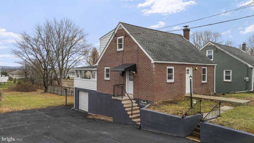 Welcome to 1779 Swamp Pike! This completely renovated, move-in-ready brick Cape offers great updates, flexible space, and a bright, comfortable layout. No part of this home went without attention! The main level features refinished hardwood floors, fresh paint, and an easy flow from the living and dining areas into the updated kitchen with butcher-block counters, gray shaker cabinets, open shelving, and stainless-steel appliances. With a large dining room, you envision yourself hosting, entertaining, and enjoying meals with friends and family. A main-floor owner's suite features a half bath for added convenience, and access to a picturesque sunroom overlooking the backyard, which is perfect for a morning cup of coffee or evening cocktail. The second floor offers two additional bedrooms with walk-in closets and an updated full bath with custom tile work. The walk-out lower level provides the laundry area, storage, future finishing potential, and access to the one-car garage, which can also be used as a workshop.  All trim and finishing work is now complete, and the home features all-new Anderson windows and updated exterior doors throughout. The peace of mind continues with a roof that is only around 5 years old. With solid updates, attention to detail, plenty of natural light, and a great location near major routes and amenities, this home is a fantastic opportunity. Schedule your tour today!