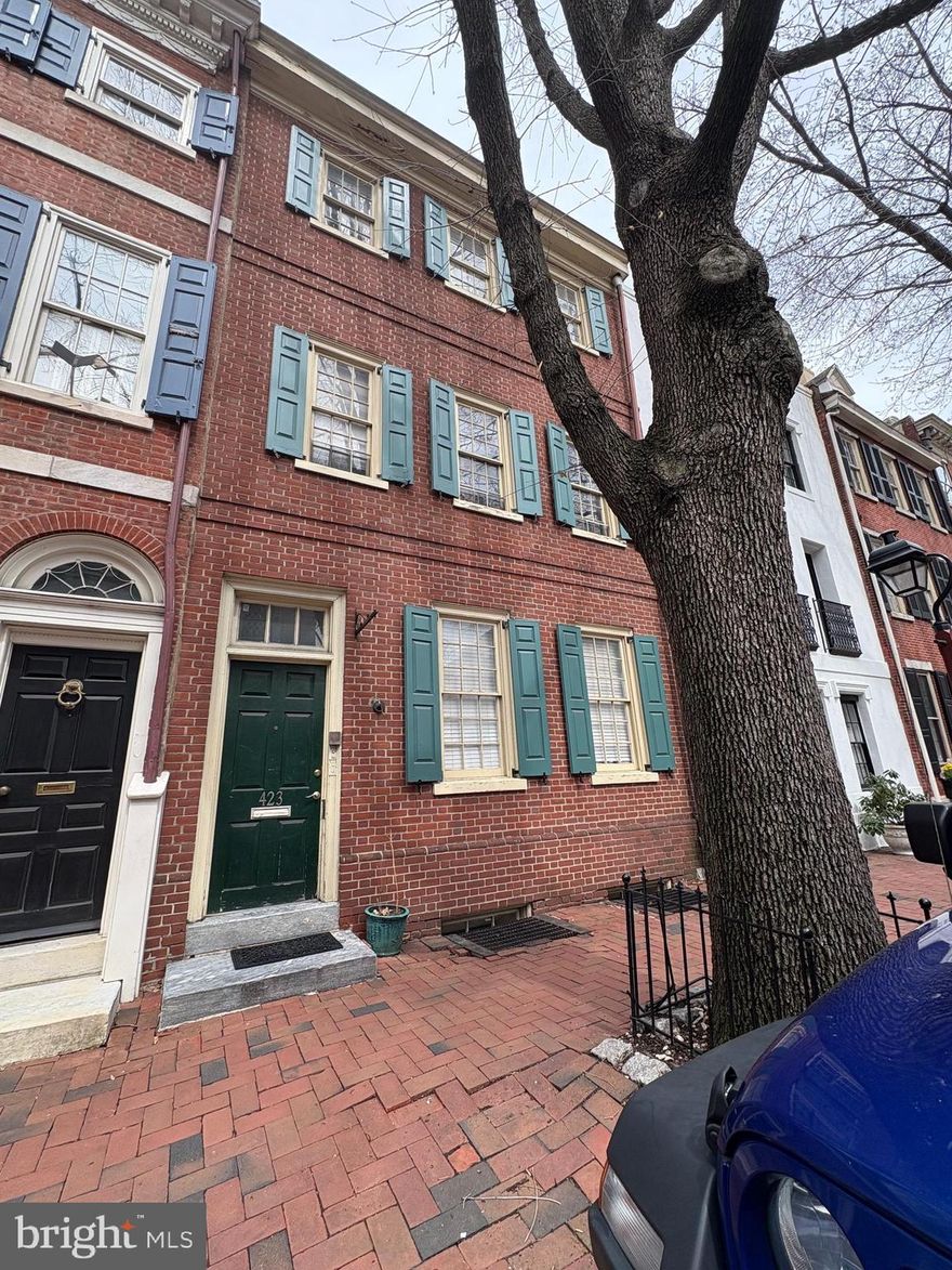 Unique opportunity to own a fully occupied 4-unit (quad) multifamily property in the heart of Society Hill, one of Philadelphia's most historic and sought-after neighborhoods. 423 Spruce Street features four spacious 2-bedroom units, each offering strong rental appeal in a high-demand location. This property is 100% occupied, providing immediate cash flow and stability for investors. Units offer well-proportioned layouts and abundant natural light, ideal for long-term tenants seeking the charm and convenience of urban living. Located on picturesque Spruce Street, the property also includes a rare 2-car parking gated carport, a highly desirable amenity in Society Hill. Residents enjoy walkable access to Old City, Washington Square, Penn's Landing and Center City, along with top restaurants, boutiques, parks, and public transportation. Society Hill's consistent demand and limited housing supply make this an exceptional opportunity for both seasoned investors and owner-occupants seeking a premier multifamily asset - a lucrative addition to any portfolio in one of Philadelphia's most enduring and desirable neighborhoods.