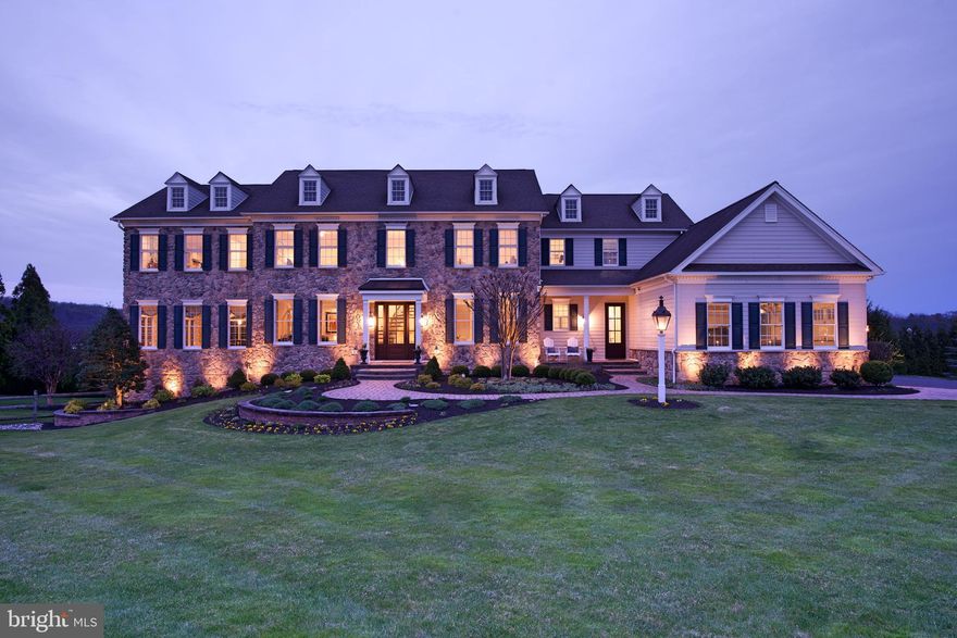 Welcome to Dutchess Farm Estates, where luxury living reaches its pinnacle! Nestled in highly-coveted Upper Makefield, this spectacular property offers an unparalleled experience in refined living. Prepare to be captivated by the breathtaking Jericho Mountain views that envelop this exquisite home, allowing you to witness the beauty of each season like never before.

From the moment you arrive, you'll be greeted by picturesque landscaping and an enchanting curb appeal that sets the stage for an extraordinary living experience. Step inside and be greeted by a grand two-story entrance foyer, adorned with a curved staircase and gleaming hardwood floors, beckoning you to explore further.

Every inch of this home has been thoughtfully designed with meticulous attention to detail. The neutral decor, intricate moldings, wainscoting, and columns exude elegance, while the hardwood flooring and abundant windows bathe the space in natural light, offering glimpses of the unique views that make this home so special. 

Indulge in the pleasures of entertainment with a charming living room that leads to a fabulous conservatory, complete with a full wet bar, wine storage, and a Bose home theater sound system—an absolute must for those who appreciate five-star hospitality!

Unwind in the generous yet cozy great room, featuring a coffered ceiling and an inviting fireplace—a perfect gathering spot for family and friends. The newly renovated gourmet kitchen is a culinary haven, boasting a large island with counter seating, a breakfast area with built-ins, and a serene ambiance to start your day on a delicious note. Completing the first level is an elegant dining room, a butler's pantry, a powder room, a spacious laundry room, and a private study—a harmonious blend of functionality and luxury.

Ascend to the second level and discover the spectacular master bedroom suite, an oasis of tranquility with a spacious sitting room, walk-in closets, and a luxurious newly renovated bath, offering the ultimate retreat from the world. Four additional bedrooms, each with its own private bathroom, provide comfort and privacy for family members and guests alike.

The lower level of this extraordinary home is an entertainer's dream, featuring a sprawling walkout basement with ample storage, a full bath, a large exercise area, and a wet bar. Whether you're a hobbyist, fitness enthusiast, or lover of games and sports, this versatile space offers endless possibilities for enjoyment.

Step outside and experience a vacation-like atmosphere in your own backyard. Immerse yourself in lush landscaping, find solace under the magnificent pergola with a handsome stone fireplace, and luxuriate in the inviting heated pool and spa area—a true outdoor oasis that completes this stunning residence.

Located within the award-winning Council Rock School District, this property combines luxury, comfort, and convenience in one remarkable package. Don't miss out on this special opportunity to call this splendid property your own. Embrace the lifestyle you deserve—schedule your viewing today and embark on a journey towards unparalleled luxury living at Dutchess Farm Estates!