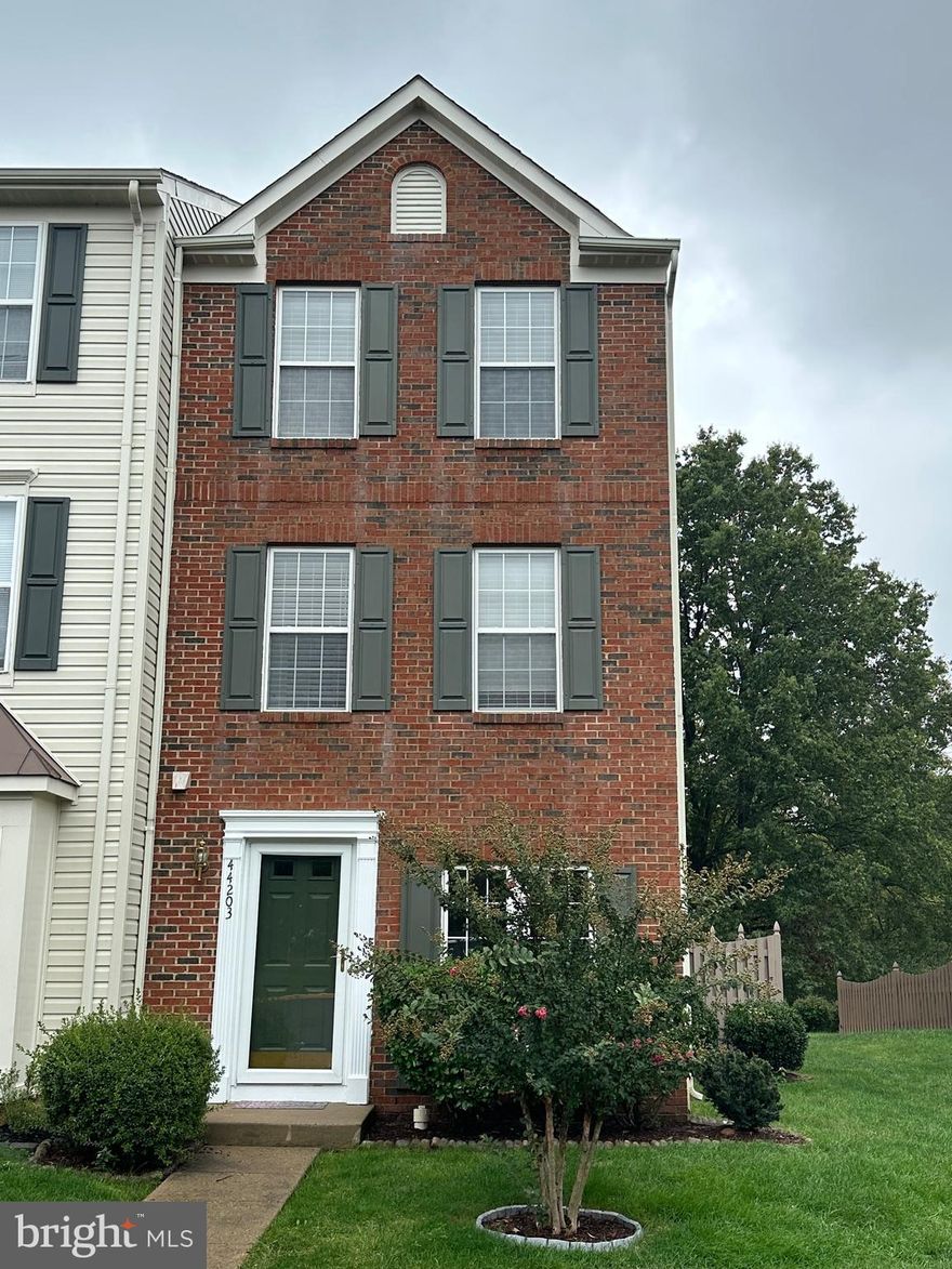 Very Large end unit.  Lots of light.  New beautiful floors throughout. As you walk into the home, the living room/dining room combination is spacious with gleaming new floors.  There is a half bath off the hallway. The kitchen has granite countertops and a separate laundry room with additional storage. There is room for a table and  doors open to the patio for easy bbq's and entertaining. The 2nd floor has a family room plus a bedroom and full bath. The 3rd level has 2 large bedrooms with jack and jill bath. Each has a ceiling fan and light. The entire house has been freshly painted with a lovely neutral color.  The  back of the house has a huge brick patio with backs to woods and open spaces. 2 assigned parking spaces are just out your front door.  Ashburn Village has an amazing recreational center with so many amenities.  Ashburn is close to Dulles Airport, multiple restaurants, shopping and the Silver Line Metro.