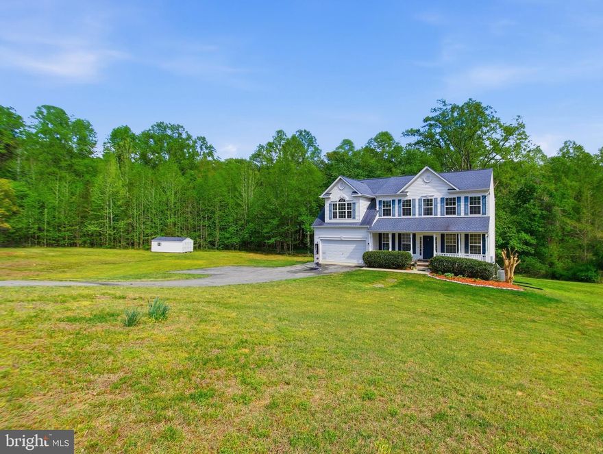 Welcome to 6284 Baywood Ct. and discover an exquisite blend of comfort in this Colonial-style residence, with an inviting front porch, nestled on a sprawling 3.01-acre lot. Built in 2009, this home boasts 2,785 finished square feet (4,089 total sq. ft.) of meticulously designed living space, perfect for those who appreciate neutral tones and ample space between neighbors. The main level has a gracious foyer with a dedicated office with double glass doors and molding details.  The formal dining room is cozy and set aside from the spacious kitchen which opens to the rear sunroom and the sizeable family room.  Your entertainment areas extend to the exterior spacious deck with stairs and the lower level patio.  This property is turnkey with a fresh coat of paint, gleaming hardwood floors and recent maintenance updates as well.  The gourmet kitchen is a chef's dream, featuring 42 inch cabinets, stainless steel new double wall ovens, stainless steel new refrigerator,  new cooktop, and a dishwasher all complemented by a built in pantry, breakfast area and rear morning room. Recessed lighting casts a warm glow over the hardwood floors, enhancing the inviting atmosphere. Retreat upstairs from the foyer or the rear stairs from the kitchen, to the luxurious primary suite, complete with a sitting area/room, two walk-in closets and a spa-like bathroom featuring a soaking tub and a walk-in shower. Three additional bedrooms offer ample space for relaxation and share the refreshed full bath with new vanity and flooring.  The formal dining room, oversized family room and cozy morning room set the stage for elegant gatherings. The basement has full sized windows and a slider that provides lots of light.  You'll have endless possibilities with space for additional rooms, storage or a recreation area.  Other property amenities include a 4 room built in speaker system with receiver included, some nee flooring, new carpet 2026, laundry room with new washer/dryer 2026, new roof 2020, new water heater to be installed prior to settlement.  The shed provides space for storage and yard work tools.  Enjoy the convenience of an attached two-car garage, an extended driveway (will receive a topcoat prior to settlement), and the tranquility of a private setting, all while being just moments away from local amenities.  The property has an "Artesian" well and a septic system.  This property is not just a home; it's a lifestyle. Experience the perfect balance of sophistication and comfort in a cul-de-sac setting that truly feels like a retreat. Don't miss your chance to make this dream home your reality!