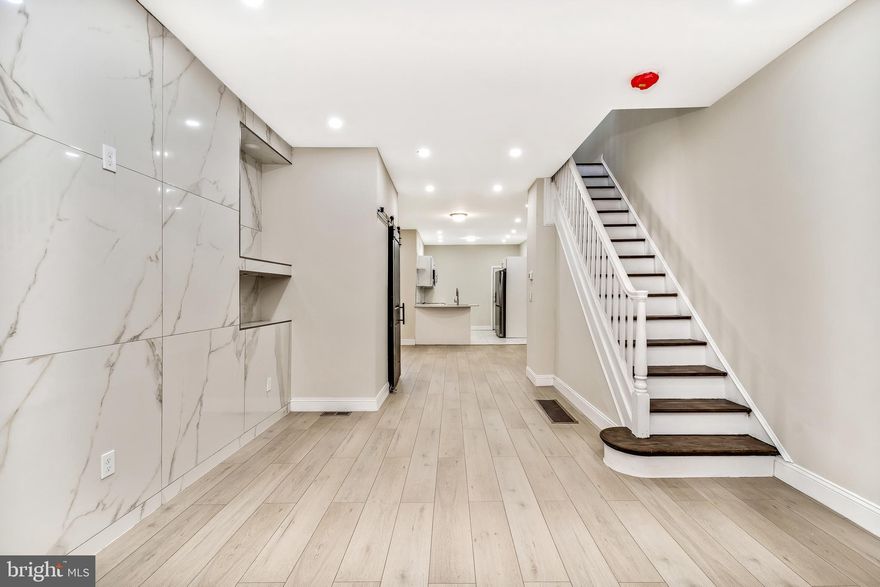 Welcome to 1039 S 54th Street. This beautiful & professionally remodeled home was designed for you. Upon entering the home from the front porch, you walk into a bright and very spacious open floor plan that is designed for contemporary living. With a beautiful fireplace and lots of natural light shining in the home. The spacious kitchen with Stainless-Steel Appliances, also leads out to a rear yard that you can entertain or relax in. This 3-bedroom 1.5 bath home is conveniently located near the Farmers' market, Dog Park, Cobb Creek Park and all of Baltimore Avenue's Restaurant, Shops & Cafes. Close to HUP, CHOP, Penn, Drexel, University of the Sciences. 12 minutes to Rittenhouse Square by car or bike and plenty of convenient SEPTA options with convenient access to Center City, Phila International Airport and all major highways. Welcome Home!!!! Philly First Home program will be accepted. The program offers a home buyer assistance grant of up to $10,000 (or 6% of the purchase price, whichever is less) to help first-time home buyers. This grant is to assist with down payment and/or closing costs. Welcome Home!!!!!!!!!