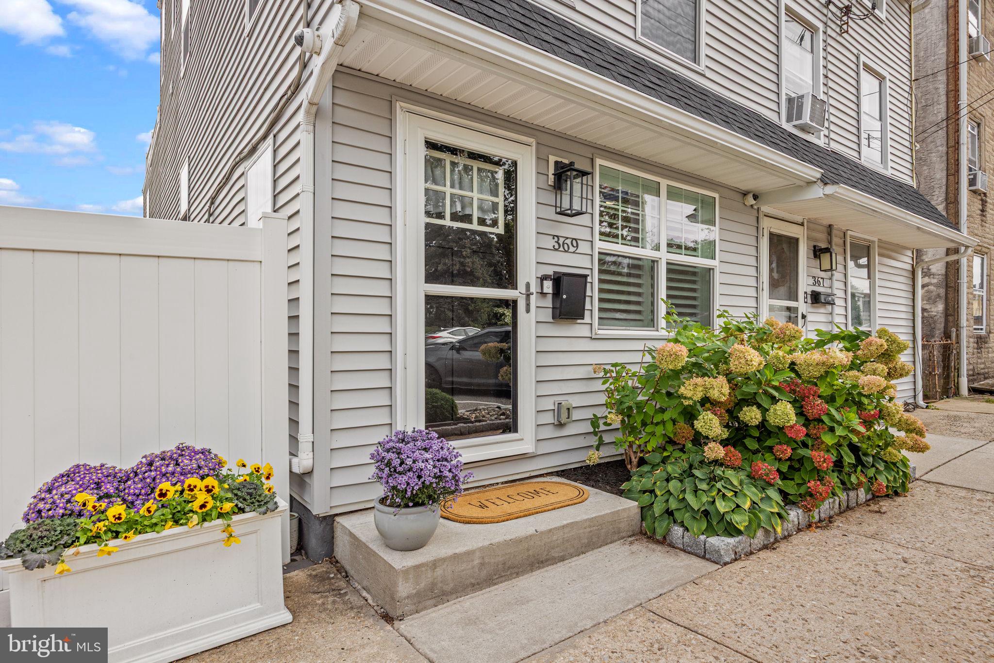 ** OPEN HOUSE: Saturday 9/27 - 10am - 12pm ** Ask for cinematic VIDEO TOUR ** This marvelous twin offers a 2-car driveway, private yard (with side and rear entrance), scenic elevated deck, dual-zone HVAC system and desirable finishes inside. What an incredible location! Walkable to savoring family owned restaurants, bars, Conshohocken Community Garden, running/biking trail, fitness facilities and Septa Regional Line (to Manayunk, Center City and 30th Street Station). Quick walk to Fayette Street to enjoy brunch spots, restaurants, sports bars, cafes and shops. From the moment you step inside, you’re welcomed by warm hardwood floors and plantation shutters that set the tone for refined living. A perfectly placed powder room adds ease when hosting, while the dining and living spaces flow naturally into one another, ready to adapt to your lifestyle. The heart of the home—the kitchen—shines with sleek granite countertops, a stylish backsplash, premium stainless steel appliances, and a spacious island. Just beyond, doors open to your private patio, where evenings of dining under the stars and weekends of effortless entertaining await. Manicured lawns and landscaping surround you, with convenient access to your two-car driveway. Downstairs, the flexible basement becomes whatever you need it to be: a gym, an office, a playroom, or simply extra space to gather. Upstairs, two serene bedrooms and a full bath accommodate family or guests, along with a thoughtfully designed laundry room for everyday ease. The top floor is your sanctuary. The primary suite offers abundant light, a California Closets wardrobe, and a spa-inspired bath with dual vanities and a beautifully tiled shower. Slide open the glass doors to your oversized deck—your private escape with sweeping views, perfect for morning coffee, sunset entertaining, or simply breathing in the fresh air. Buyers are responsible for verifying square footage and taxes.