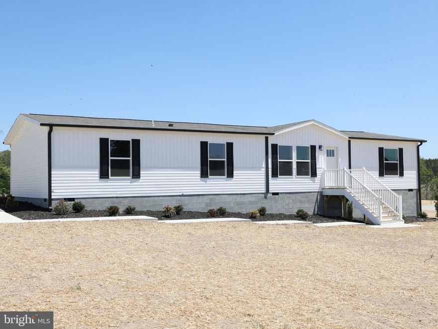 COMPLETE! Brand-new 3-bedroom, 2-bath home situated on 2.14 acres, conveniently located just minutes from Mineral and a short drive to Lake Anna. The interior offers 1,791 square feet of living space with an open floor plan, two living areas, and office space. Features include Shaw Lino flooring, a coffee bar area, decorative accent wall, large island and recessed lighting. The kitchen is well appointed with Duracraft cabinetry, stainless steel appliances, pot-and-pan drawers, a decorative range hood, and a utility room located just off the kitchen. The primary suite includes a double vanity and a spacious tub/shower combination. Exterior highlights include a farmhouse-style design, extensive landscaping, a large rear deck, and concrete walkways. Home is located within the Firefly internet service area!