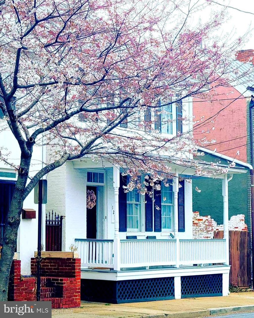 An incredible find in Downtown Frederick, this beautifully renovated single-family home perfectly blends modern updates with historic charm. The inviting front porch welcomes you into a true community lifestyle that's ideal for greeting friends and neighbors.

Inside, you'll find a functional and thoughtfully designed layout with updated kitchen and baths. The fully custom kitchen is a chef’s dream, featuring abundant storage and workspace. A convenient laundry room just off the kitchen adds extra functionality and includes a laundry chute from the owner’s suite above. A separate dining room, spacious living room with fireplace ready for an insert, and powder room complete the main level.

Upstairs offers three bedrooms and two full baths, along with a charming side balcony and a finished attic that provides valuable bonus space for a home office, studio, or guest area.

Outside, the fenced backyard is perfect for relaxing or entertaining, featuring a patio, workshop, and oversized parking pad. Enjoy the best of Downtown Frederick living with easy access to Baker Park, art galleries, restaurants, and more. Everything you love is just moments from your door. This is a rare opportunity you won’t want to miss. PHOTOS COMING SOON!