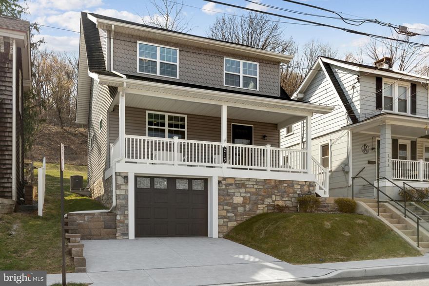 Welcome Home to this fabulous single home completely renovated in 2019 with the highest attention to detail. The owner, and designer, has created amazing spaces in this home that match a variety of tastes and décor creating an artists dream. 213 Moorehead Avenue is a must see 3 bedroom, 1 full bath home with luxurious finishes like the site finished red oak hardwoods throughout, neutral paint colors, rare Volga blue granite counter tops, white subway tile in the kitchen and luxurious bath with black and white hexagon mosaic tile. The finished basement is equally interesting with rustic oak wall planks and brown stamped concrete floors with matching shelving and tables that stay with the home. The outside of the home provides amazing spaces including the expansive front covered porch and oval rear patio, landscaping and yard both providing the privacy of a single home and more room for entertaining. The dutch lap vinyl siding with scallop accents is complimented by craftsman style white porch posts, railing and steps. Stone accents and a sleek custom black garage door with lites provide contrasts that bring out the beauty of this homes design. The owner opened the floor plan, adding windows and creating a decorative foyer entrance, living room and huge kitchen with plenty of white shaker cabinetry, granite counters featuring a large island for entertaining, a built-in pantry and kitchen and morning room and dining area. A full set of upscale stainless appliances completes the kitchen. The second level includes 2 private bedrooms and a third bedroom with towering ceiling and steps to a loft as wide as the home providing more sleeping options and a cool home office option. The luxurious full hall bath is a work of art featuring a comfort height double vanity with quartz counters and a huge walk in shower with glass block window allowing outside light in. The finished basement with amazing custom wood work is ready for beer, cider, wine tastings or cocktails and your favorite sporting events and entertaining. Five panel solid core doors with ornate crystal and bronze metal hardware, antique lighting accents, recessed lighting, two piece crown molding, larger baseboards and custom metal air supply covers add the finishing touches to this customized designer home. New thermal windows and doors throughout the home along with central air and natural gas fired heating and hot water. This home has been rated “Energy Efficient” and awarded the PECO rating of “the most energy efficient property on the block”. Closed cell spray foam insulation was added during renovation to prevent water penetration and as additional insulator. Located in highly ranked Upper Merion Schools and located in popular West Conshohocken with its upscale variety of restaurants and night spots and just a short walk to the train into the city. Easy access to Center City and Routes 76, 476, 276 and the Philadelphia International Airport.