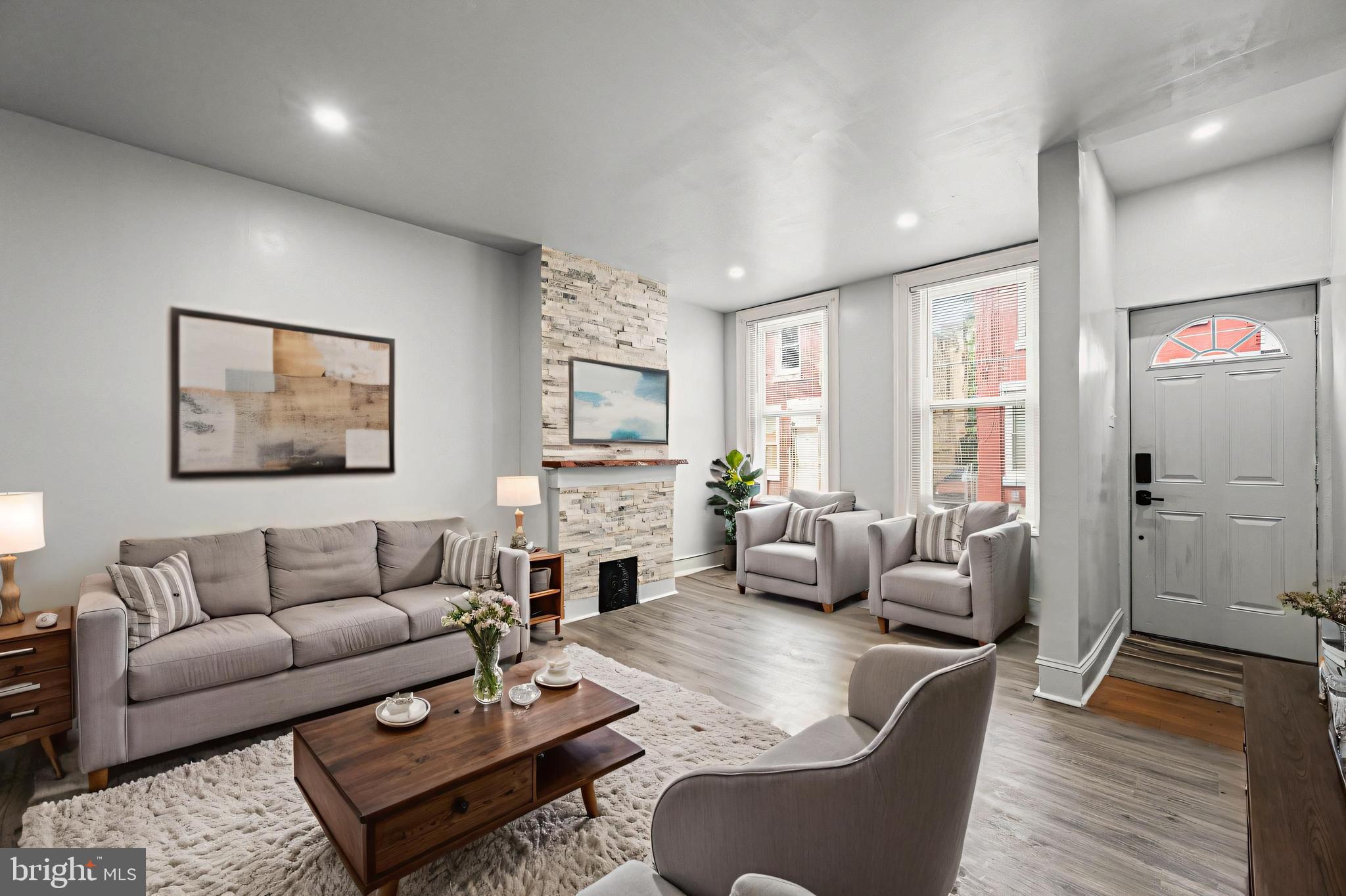 Welcome to 1232 W Sergeant Street, a beautifully updated home in the heart of Philadelphia offering style, space, and functionality. Step inside to find fresh paint and brand-new luxury plank flooring that flows through the open-concept living and dining areas. Bathed in natural light and enhanced by recessed lighting, the space feels bright and inviting. A stone-accented faux fireplace with a wood mantle adds a warm, cozy focal point. The modern kitchen is outfitted with gray shaker cabinets, sleek countertops, a stylish backsplash, and stainless-steel appliances including a range, hood, and refrigerator. Upstairs, you’ll discover a spacious primary bedroom, two additional bedrooms, and a fully renovated bathroom with designer finishes. The finished basement offers additional living space, a laundry area, and a convenient half bath, perfect for a home office, playroom, or guest retreat. Out back, the fenced yard provides the perfect outdoor space to relax, grill, or entertain. Don’t miss your chance to own this move-in-ready gem at 1232 W Sergeant Street, a perfect blend of modern upgrades and classic charm.