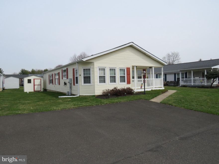 Welcome home to this beautifully updated and meticulously maintained Chalfont model in the desirable Villages of Buckingham Springs. This move-in ready home has been thoughtfully upgraded throughout, offering both comfort and peace of mind.

Major exterior improvements include a new roof and siding (2018), along with a low-maintenance Trex front porch—perfect for relaxing outdoors.

Step inside to a welcoming foyer with a convenient coat closet, leading into a bright and spacious living room. The formal dining room flows seamlessly into the updated kitchen, featuring a stunning backsplash, upgraded appliances, and easy access to the cozy breakfast room.

The laundry room offers added functionality with a built-in desk area and extra cabinetry for storage, and provides direct access to a side patio complete with a retractable awning—ideal for outdoor enjoyment.

Down the hall, you’ll find a fully updated hall bathroom with a new tub, toilet, and flooring. Bedroom two is generously sized and includes two closets. At the end of the hall, the primary suite offers a peaceful retreat with a large walk-in closet and a private bath featuring a soaking tub, separate shower, and an updated double vanity with new sinks and countertop.

With so many updates already completed, this home is truly ready for you to move in and make it your own.