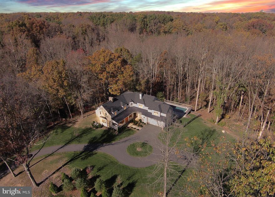 Tucked away & surrounded by nature, this rebuilt 1940 s farmhouse showcases handcrafted craftsmanship & design at every turn. Meandering creeks & a nearly 4-acre rustic park-like setting will appeal to the nature & privacy lovers senses, while a brand-new construction experience will ease the spirit and let hassle slip away. All new infrastructure systems (electrical, plumbing, HVAC), pool & more.