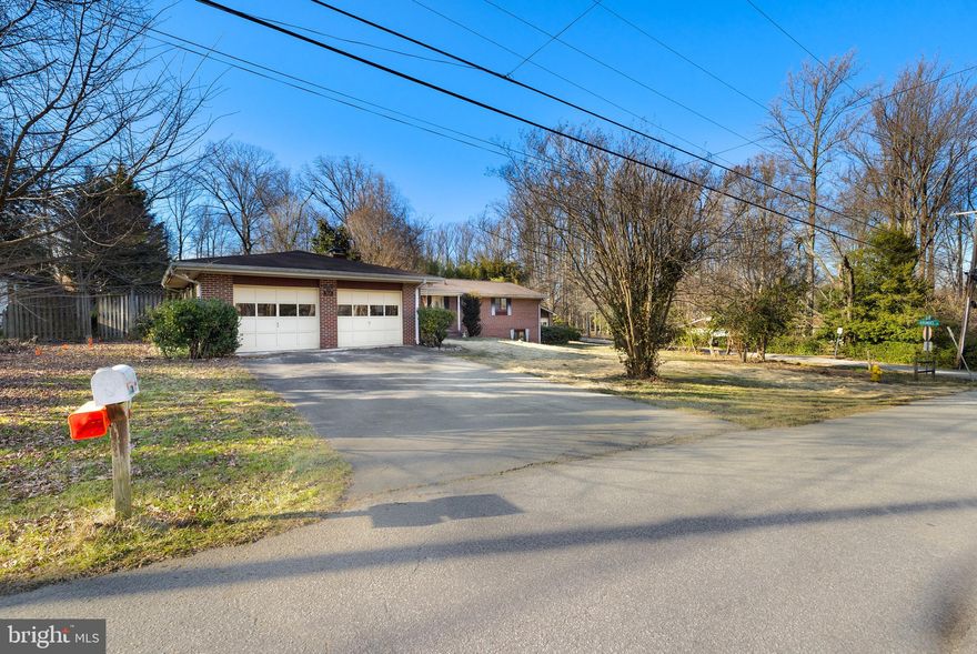 Public Open house this Saturday the 24th from 10am to 1pm.

This charming all-brick rambler sits proudly on a fantastic half-acre corner lot, conveniently within walking distance to both Arundel Middle & High Schools and a short commute to the Odenton Marc, Ft. Meade, NSA, and major routes like 32 and 97. While being sold strictly AS-IS, this property presents a multitude of features that render it an enticing option for those eager to invest some sweat equity and build value.

Much of the main level boasts the timeless allure of Oak Hardwood flooring throughout, complementing the layout which includes three bedrooms, one and a half baths, a sunroom off the kitchen, and a cozy wood-burning fireplace in the formal living room. Accessible through a traditional mudroom, the attached oversized two-car garage conveniently connects to both the covered front porch and the backyard.

Offering ample natural light, the basement features a family room, bedroom, full bath, laundry facilities, and a mechanical room. Accessible via an interior staircase or a separate side entry, the basement provides additional flexibility and functionality.

Step outside to discover a serene oasis complete with an in-ground pool surrounded by a stamped concrete deck, perfect for lounging and entertaining. Additionally, a detached shop/2-car garage provides extra space for storage or hobbies.

Noteworthy is the removal of the underground storage tank from the front yard.