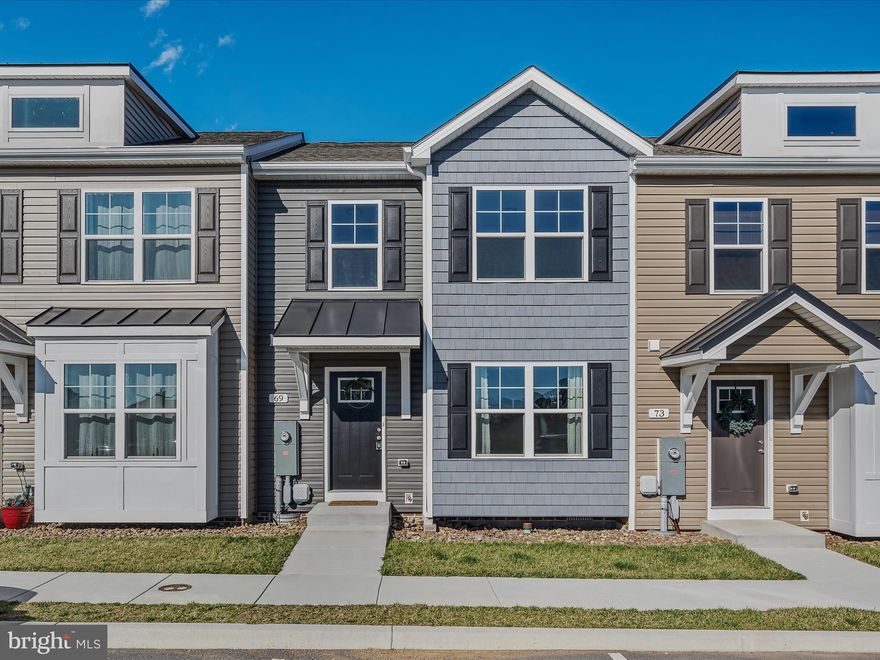 Welcome to this **beautifully designed 2-level townhome**, built in 2023, located in a **prime spot** off Route 9 & Route 11 in Martinsburg, WV! This **modern home** features **3 spacious bedrooms, 2 full baths, and a convenient half bath**—perfect for comfortable living. The **open-concept kitchen** boasts stunning **granite countertops**, sleek cabinetry, and plenty of space for cooking and entertaining. Step outside onto the **rear deck** and enjoy the fresh air! Stay comfortable year-round with **central air conditioning and energy-efficient natural gas heating**. Additional perks include a **built-in sprinkler system** for peace of mind and **2 dedicated parking spaces**. Enjoy the benefits of **low-maintenance townhouse living** with an incredible price of **$252,900**!