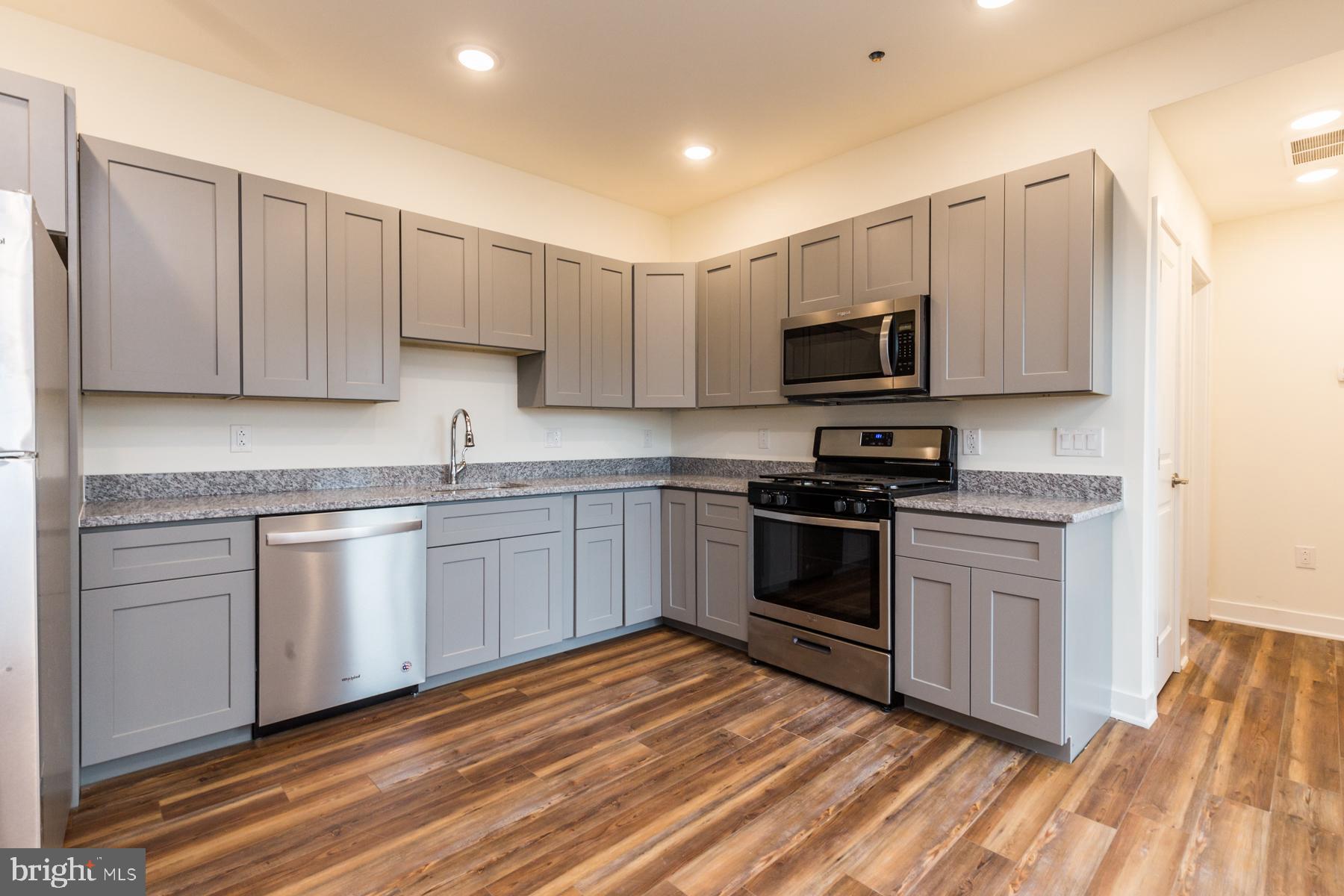 Available Now Boston Street Flats is a brand new, contemporary building that just finished up construction.There are nine different floor plans (plus an ADA unit on the ground floor), all of which include outdoor space. Designed with style and convenience in mind, the contemporary building features unique construction designed specifically to minimize acoustics. Hardwood floors, gray soft close cabinetry, stainless steel appliances and modern design flow throughout each unit. Washer and dryers, as well as dishwashers, are in every unit for added convenience. No detail was spared in this project!The building amenities include: a secure lobby and package room, two storage rooms with cages in the basement for each unit (included in rent), a large bike room, elevator, basement level fitness center, and a green roof accessible to all with 360 degree views of the city.Located just one block from the York-Dauphin MFL Septa station, you ll have quick access to Fishtown, Temple Area, Center City in just minutes! The Septa 3 and 39 buses are conveniently on the same block, and local favorites like Martha, Atlantis the Lost Bar and Franny Lou s Porch are all within walking distance.Schedule a showing today! With nine different floor plans, this building has something for everyone! (Please note staged photos are example from similar unit.)Generally, first month, last month, and one month security deposit due at, or prior to, lease signing. Other terms may be required by Landlord. $45 application fee per applicant. Pets are conditional on owner s approval and may require an additional fee, if accepted. ($500/dog and $250/cat). Tenants responsible for all utilities: $50/mo flat water fee, gas, electricity, cable/internet. Tenants will have the option of either using Verizon Fios or Comcast for their telephone/cable. $90 move-in fee. Make your move easier with discounts at local moving companies! Speak to your leasing agent for details on promotions at BR Movers and Sultans of Schlep.