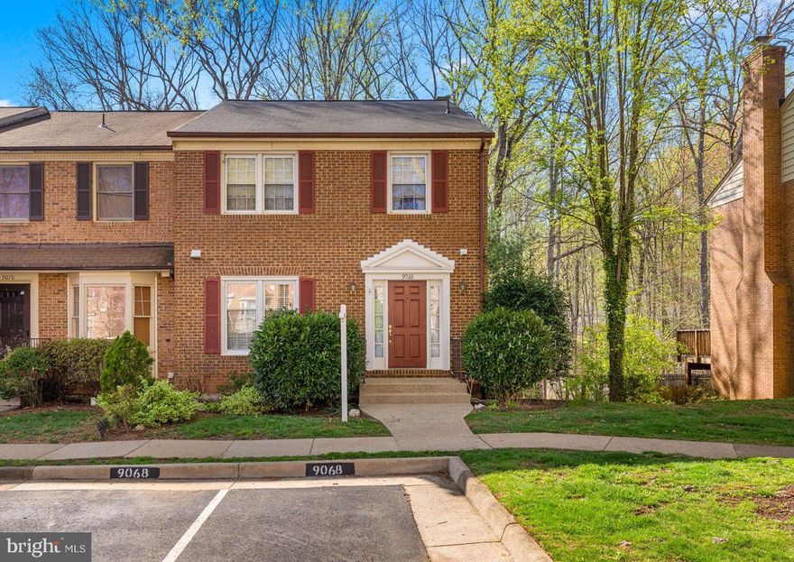 Welcome to this beautifully built, all-brick end-unit townhome offering comfort, space, and a premium location.

Set against a backdrop of lush woods, this home boasts a private Trex deck, fenced-in yard, and lower-level patio—ideal for relaxing or entertaining outdoors. Just steps from scenic Huntsman Lake and within walking distance to the local shopping center, this location perfectly blends natural beauty with everyday convenience.

With over 2,500 square feet of living space, this residence stands out for its thoughtful design. The main level features a library with custom built-ins—a perfect work-from-home retreat. Upstairs, the spacious primary suite offers a peaceful escape, complemented by a fully remodeled primary bath with elegant finishes.

The bright, walk-out lower level includes a cozy recreation room with a brick fireplace, a wet bar, and direct access to the patio—great for entertaining or enjoying quiet evenings. An oversized utility room provides ample storage space and flexibility for hobbies or future customization. The roof was replaced in 2019.  The windows and sliding glass doors have been replaced. 

View floor plans at end of photos.

Don’t miss the opportunity to own this exceptional townhome in a truly desirable setting!