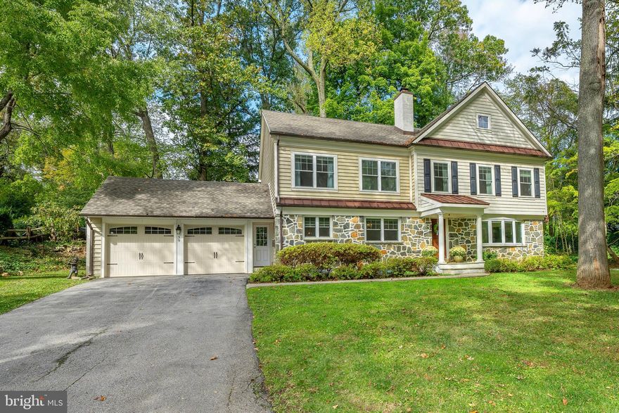 Nestled in the sought-after Strafford Village community in Wayne, 39 Crestline Road is a stately stone colonial that combines a modern aesthetic with a traditional style.  Unlike many of the other homes in Strafford Village which are older and much smaller, this house has over 3,600 square feet of finished living space along with a much more modern and open floor plan that is uniform throughout the house. The house was  built ten years ago on the site where an existing house was located.  A very small portion of the previous structure was preserved and used in the construction of this house, but everything else was built new. The first floor welcomes you with hardwood floors, and a striking double-sided stone fireplace separates the foyer and dining room. The sun-drenched in-home office and open kitchen with white cabinets, gleaming granite counter tops, high end stainless steel appliances, and a large island which creates an inviting atmosphere that flows right into the adjacent family room which features custom built-ins that perfectly frame the gas fireplace and TV/ entertainment center. The fully finished basement which is accessed from the kitchen offers plush carpeting and tons of play or work space and another half-bathroom. The second floor has four bedrooms, all with generously sized closets and three full bathrooms, one of the bathrooms is a large jack & Jill connecting to of the bedrooms. The other two are en suite including the large and luxurious primary bathroom that is highlighted by an oversized stall shower, soaking tub and dual vanity. The primary suite itself is huge and comes with ample closet space between three separate closets, one of which is a huge walk in. Heading outside, this property has great  living and entertaining space is highlighted by a large deck off of the kitchen which overlooks the private back yard area. the two car garage has direct access under a small covered portico directly tot he mudroom & laundry room then the kitchen pantry area and half bathroom.  With it's proximity to the Strafford train station, downtown Wayne, and being part of the esteemed Tredyffrin/ Easttown School District, this property is a rare find in one of the most desirable locations on the Main Line. Move right into this beauty and become a part of the Strafford Village community and all it has to offer!