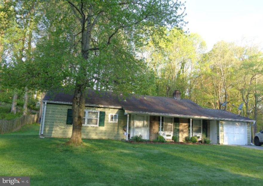 Built in 1971, this one level home offers approximately 1248 finished square feet, three bedrooms and two full baths, fireplace, covered front porch and attached one car garage. This home sits on an approximate 15276 sqft lot.