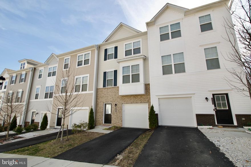 Welcome to this exceptional 3-story townhouse ideally located in the heart of Stafford.  This home only 3 years old features 3 spacious bedrooms, 2 full bathrooms, 2 half bathrooms, and a one-car garage. This modern home offers comfort, style, and convenience. The main level boasts an open floor plan with luxury vinyl plank (LVP) flooring throughout.  Enjoy a beautiful kitchen with stainless steel appliances, a large center island with seating, abundant counter space, and a seamless flow into the dining and living areas.  Step out onto the expansive deck, perfect for relaxing or entertaining. Upstairs, you'll find three  bedrooms filled with natural light and ample closet space. The primary suite features a luxurious ensuite bath and a walk-in closet, offering a private retreat.  Two additional bedrooms and a full bathroom complete the upper level. The lower level provides a versatile recreation room, a convenient half bath, and plenty of storage space. Enjoy the outdoors in your private, fully fenced backyard. Located less than 10 minutes from Quantico Marine Base, I-95, and the express lanes, this home offers easy access to major commuter routes and local amenities. Don’t miss the opportunity to make this beautiful townhouse your new home!