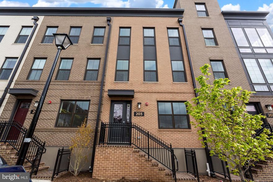 Built in 2022, this luxurious townhome for rent in North Old Town has spectacular views of the Potomac River!  Spacious 3 bedroom, 3.5 bath, stylish home with tall windows, wood floors and fine finishes throughout.  A contemporary open floor plan design offers many windows and a Great Room filled with natural light.  On the first floor, you'll find a room to us as an office, den/TV room, library...whatever you wish to create.  On the main level, the Great Room is marvelous with many tall windows and handsome floors.  The chef's kitchen will delight you with its quartz counters, Bosch stainless appliances, gas cooking and soft-close drawers.  The dining area is bright and transitional.  On the third level, the primary suite has expansive closet space and an elegant primary bath with beautiful marble, an enormous shower and back-lighted mirror over the dual vanity.  A convenient laundry room is on this level.  Both the 2nd and 3rd bedrooms are spacious and bright with ample storage.  The top floor features a loft/family room that opens to a large private terrace with an exciting river view.  A two-car garage completes this fine property.  Exceptional location where you walk to many exciting restaurants, convenient shopping.  Close to Reagan National Airport, Metro/Amtrak, and everything in Washington, DC.