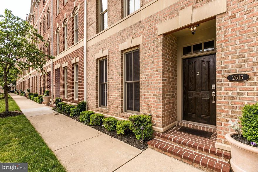 This beautifully appointed, 4 story townhome located within The Moorings at Lighthouse Point -  the only gated waterfront community of luxury homes in Baltimore’s vibrant Canton neighborhood - offers an exceptional combination of modern amenities, spacious interiors, abundant storage and stunning waterfront views. With a 2 car garage and plenty of on street parking, this residence provides security and privacy while allowing easy access to the waterfront promenade and flourishing resources in Canton.  

Property Highlights:  
•Prime Location: Situated steps away from the waterfront promenade, enjoy easy access to restaurants, parks (including dog parks), a grocery store, medical offices, gyms, and a swim club.   
• Parking: Features a two-car garage and ample neighborhood parking  
•Upgraded Flooring: Wide plank flooring throughout, enhancing the home’s elegance. Layout Overview:   •Lowest Level: Versatile, open space with LPV flooring, ideal as a bonus room for gatherings, a fourth bedroom and/or home office.   
•Second Level: Newly upgraded kitchen with a large, quartz center island, Viking gas stove and refrigerator, tile backsplash, wine refrigerator and beer refrigerator, custom built-ins surrounding the fireplace, half bath, and rear balcony.   
•Third Level: Two bedrooms and two full bathrooms, with the front bedroom offering water views, an exclusive balcony, and walk-in California Closets. The back bedroom has an ensuite bathroom with two generously-sized closets.  A dedicated laundry room and separate storage room complete the functionality of this home.   
•Fourth Level: Owner’s suite featuring vaulted ceilings, a private balcony, tastefully stone-tiled bathroom with a dual-head shower and spa tub, large California Closets, and additional storage space. With breathtaking water views, spacious interiors, ample storage, and unparalleled convenience, this property truly has it all.